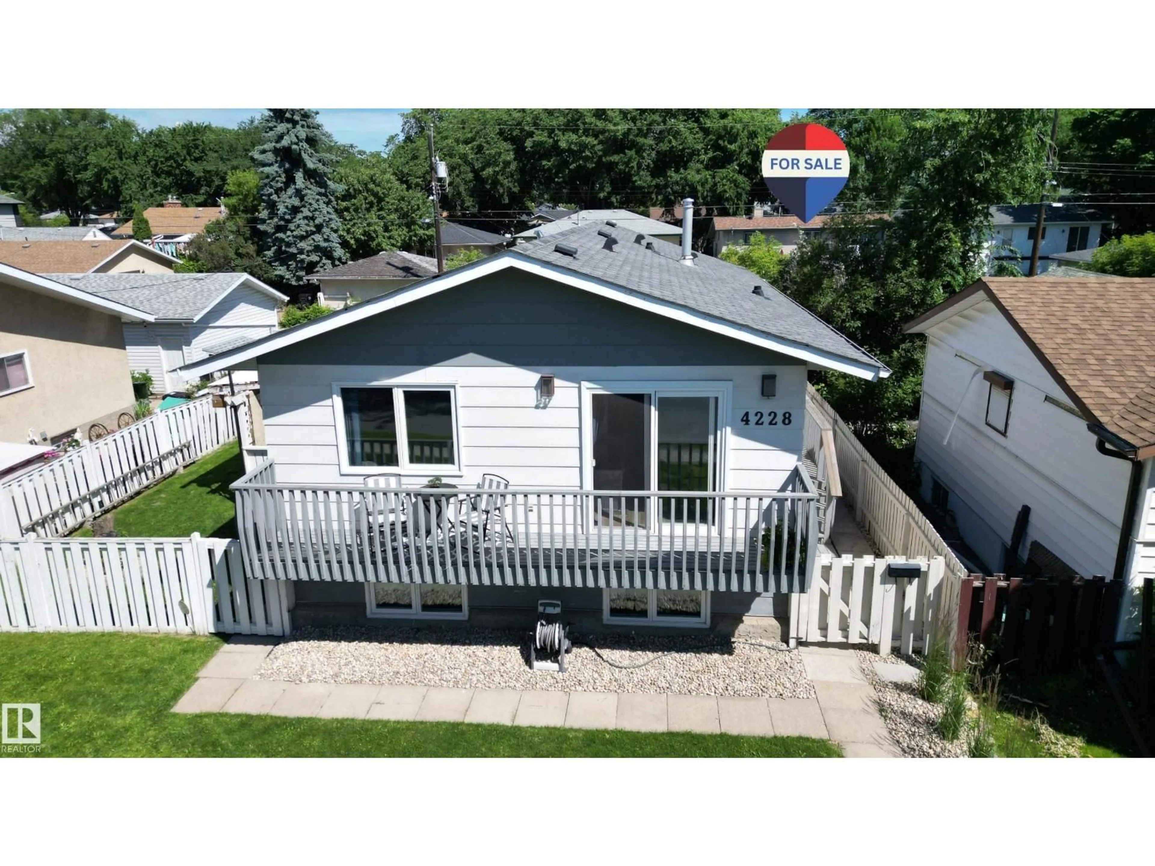 A pic from outside/outdoor area/front of a property/back of a property/a pic from drone, street for 4228 114 AV, Edmonton Alberta T5W0T2