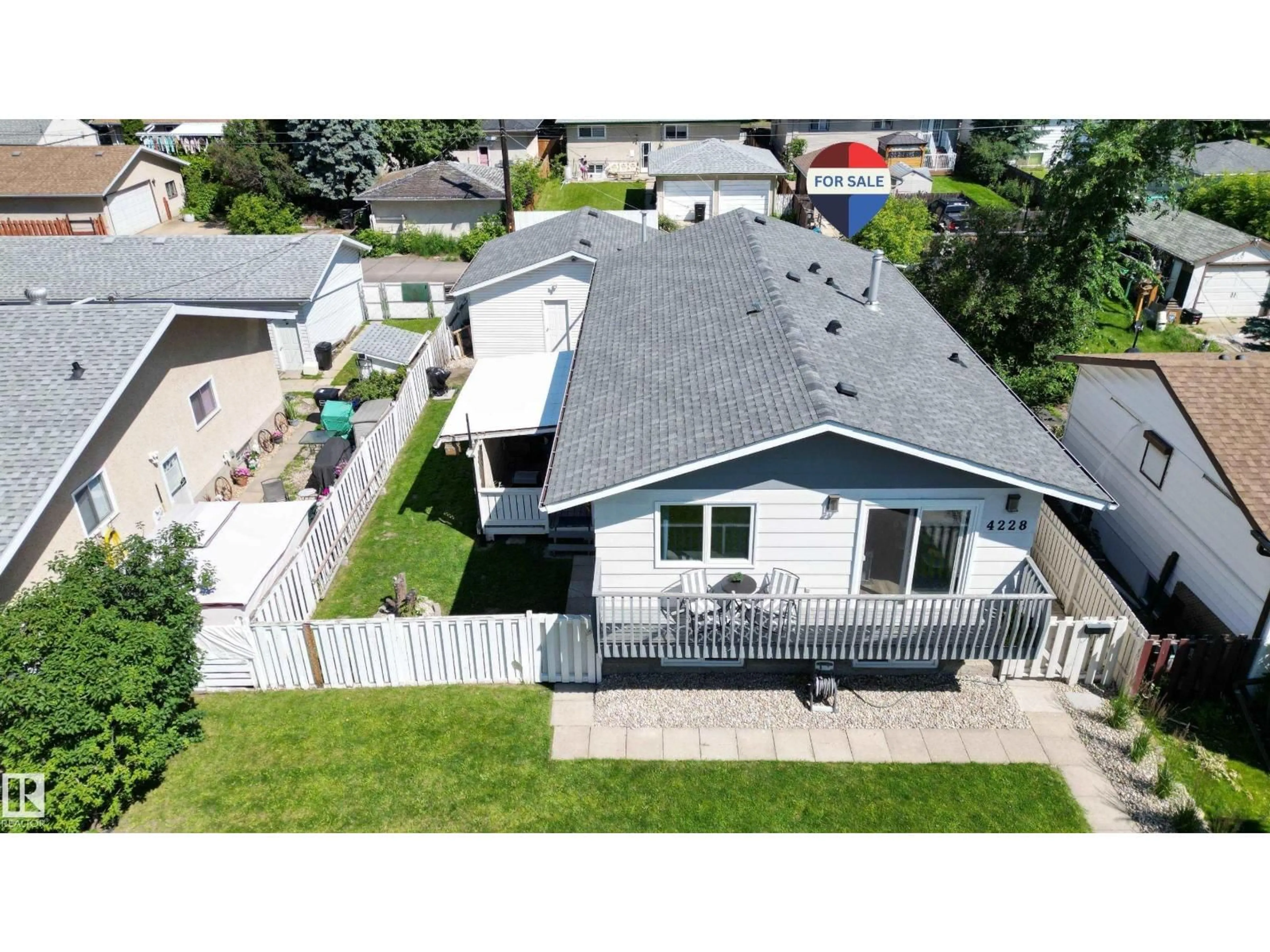 A pic from outside/outdoor area/front of a property/back of a property/a pic from drone, street for 4228 114 AV, Edmonton Alberta T5W0T2
