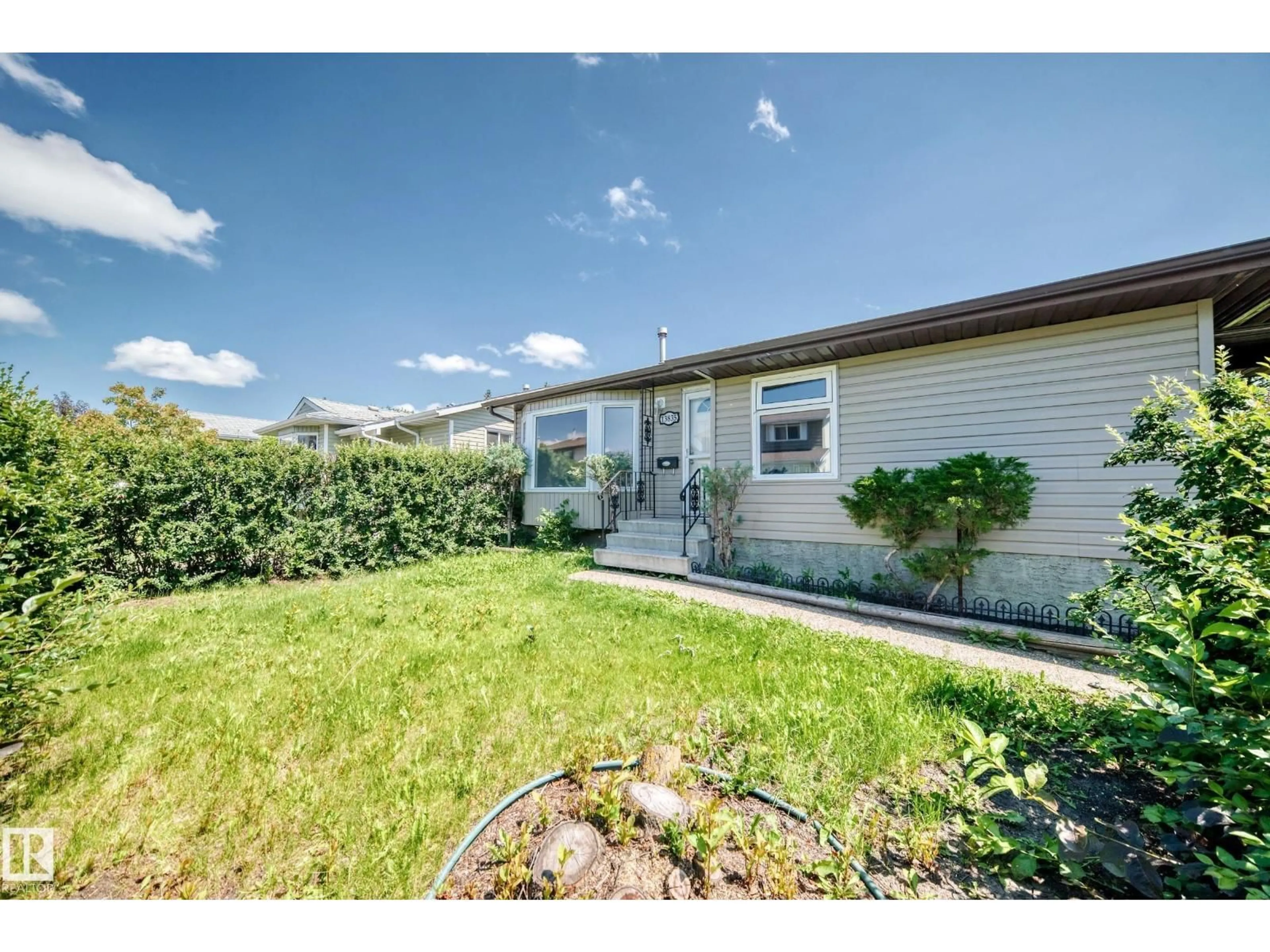 A pic from outside/outdoor area/front of a property/back of a property/a pic from drone, water/lake/river/ocean view for 13835 114 ST, Edmonton Alberta T5X4A1