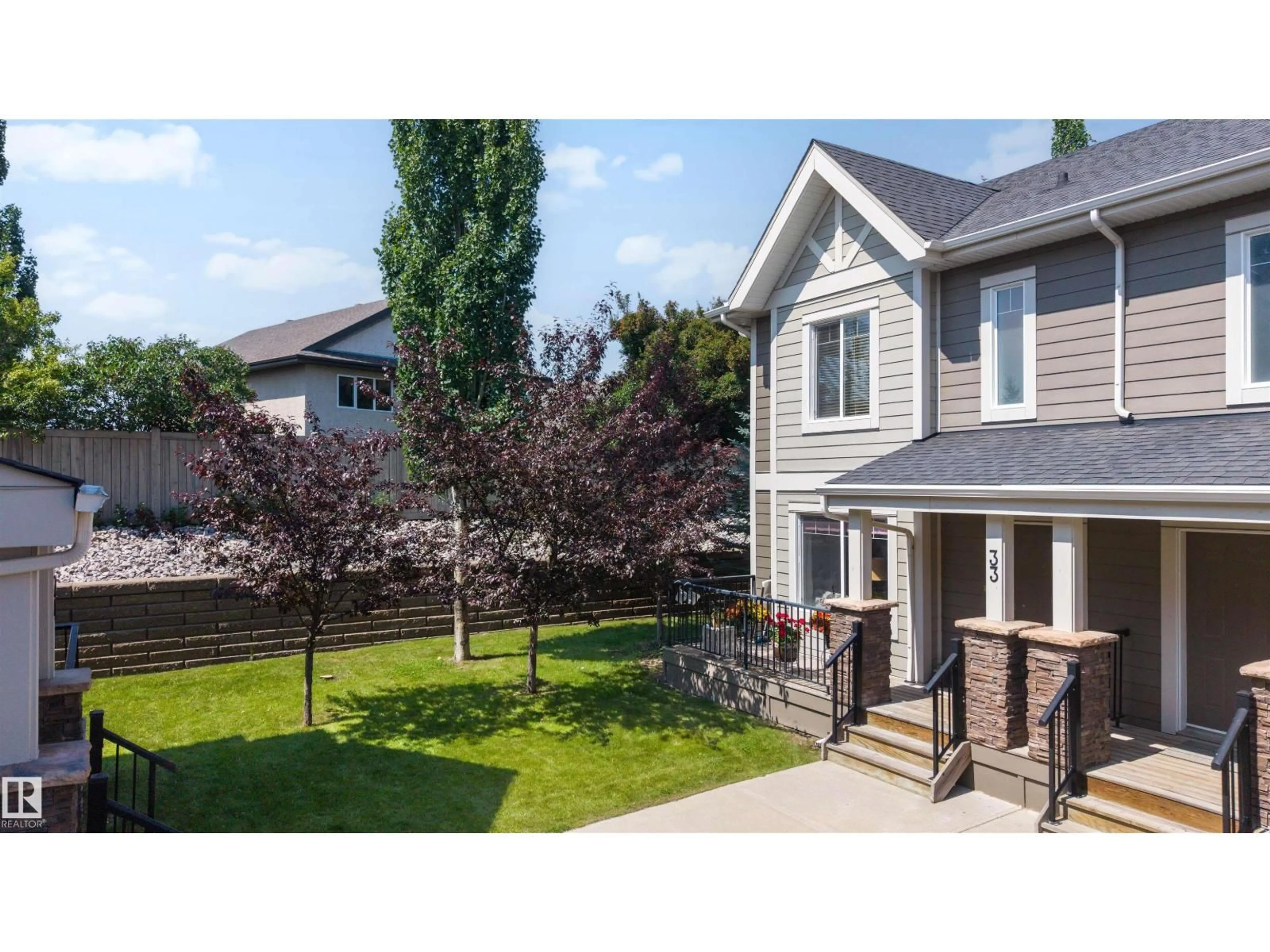 A pic from outside/outdoor area/front of a property/back of a property/a pic from drone, street for 33 - 1150 WINDERMERE WY, Edmonton Alberta T6W2B6