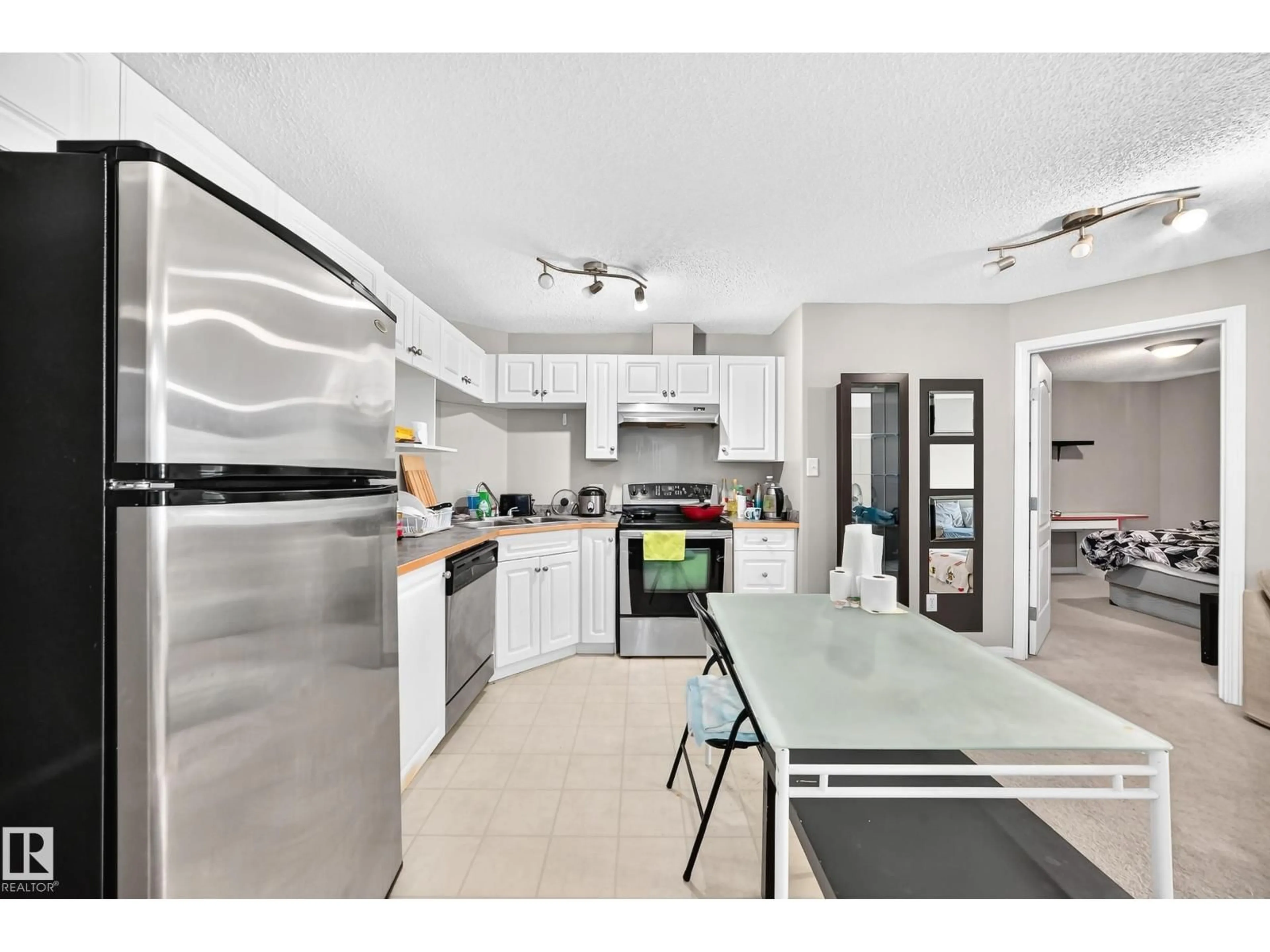 Open concept kitchen, ceramic/tile floor for #221 - 5350 199 ST, Edmonton Alberta T5M0X5