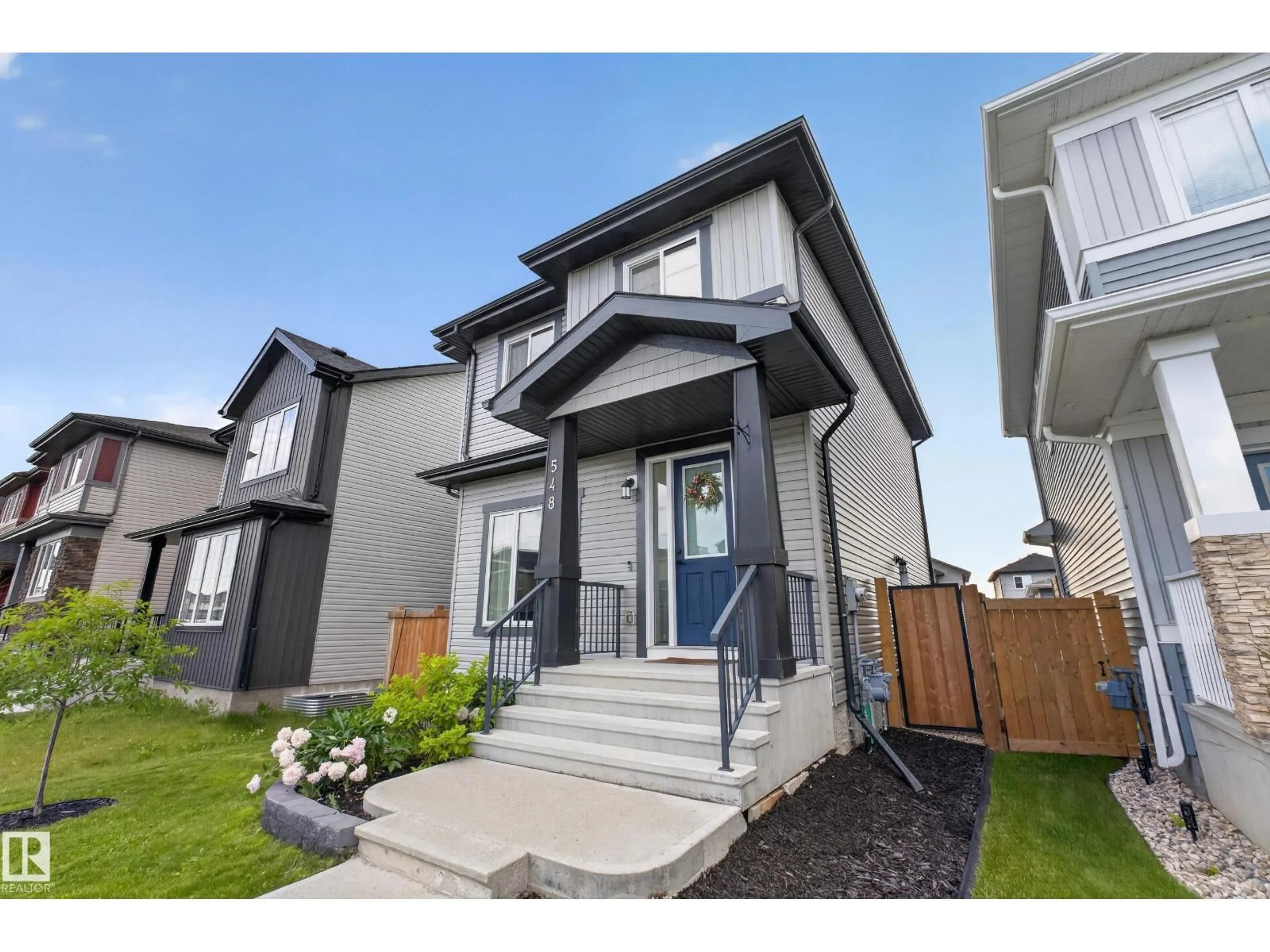 Home with vinyl exterior material, street for 548 KLEINS CR, Leduc Alberta T9E1M5