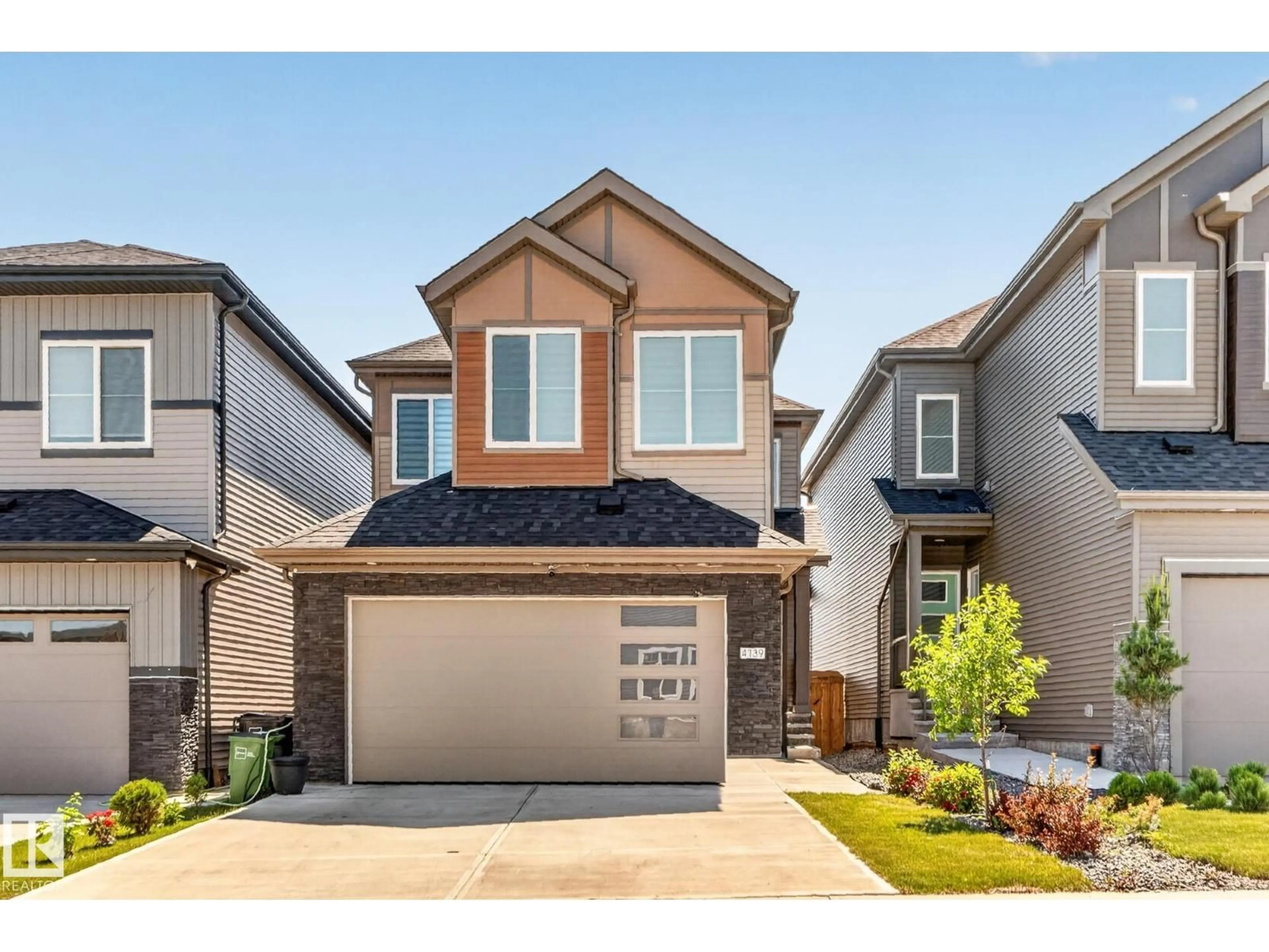 Home with brick exterior material, street for 4739 168 AV, Edmonton Alberta T5Y0W3