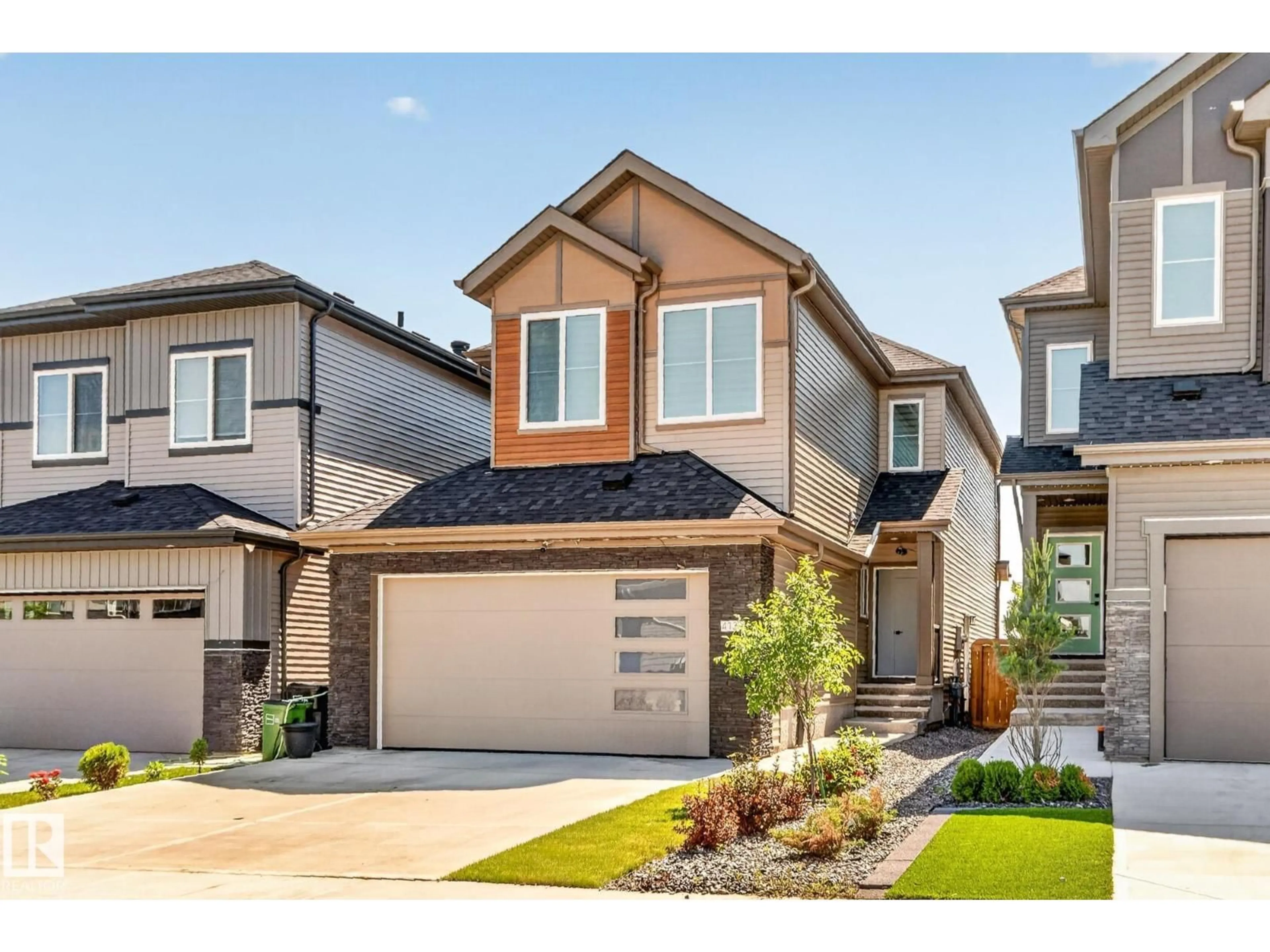 Home with brick exterior material, street for 4739 168 AV, Edmonton Alberta T5Y0W3