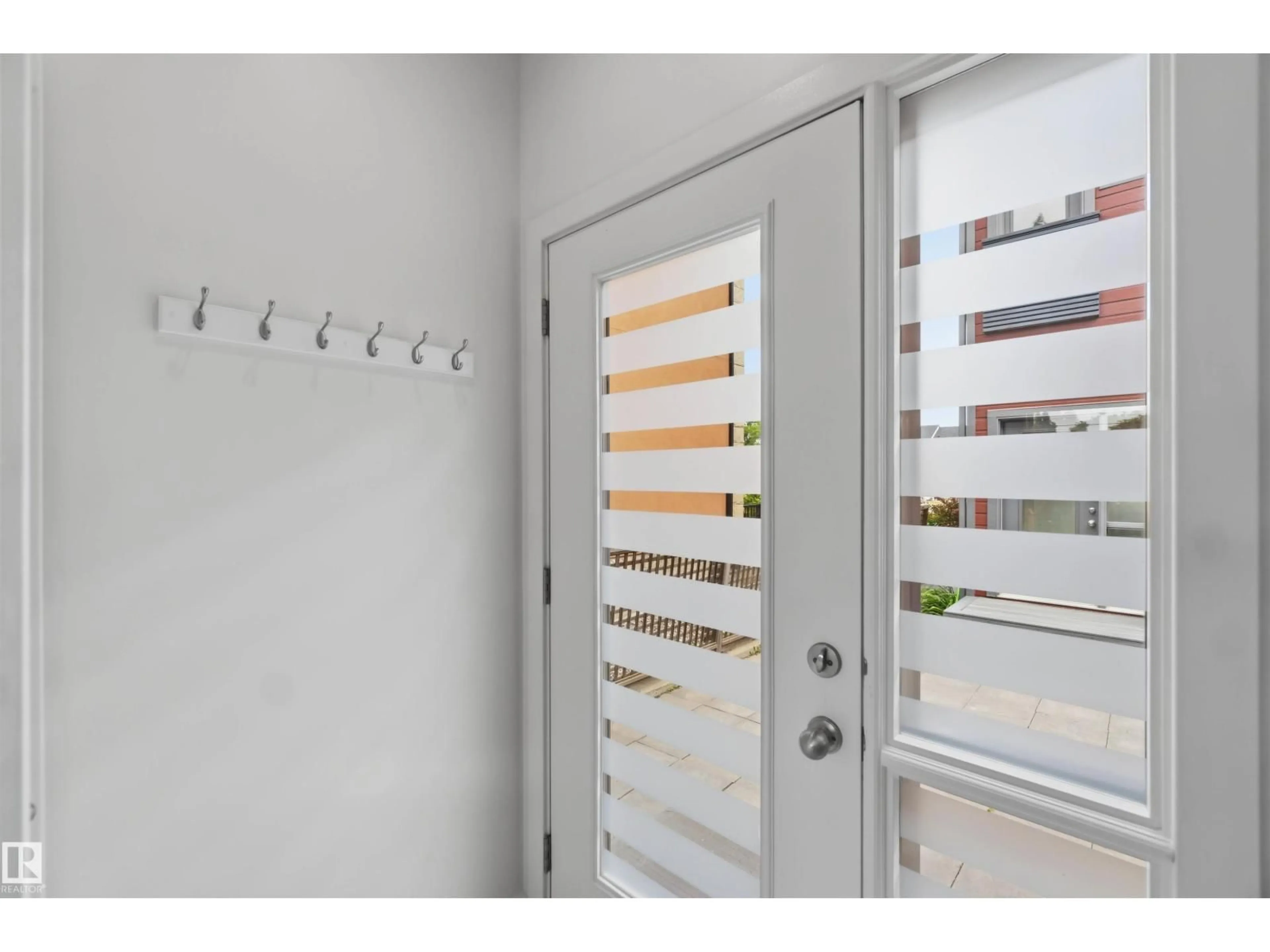 Indoor entryway for 14315 STONY PLAIN NW, Edmonton Alberta T5N3R6