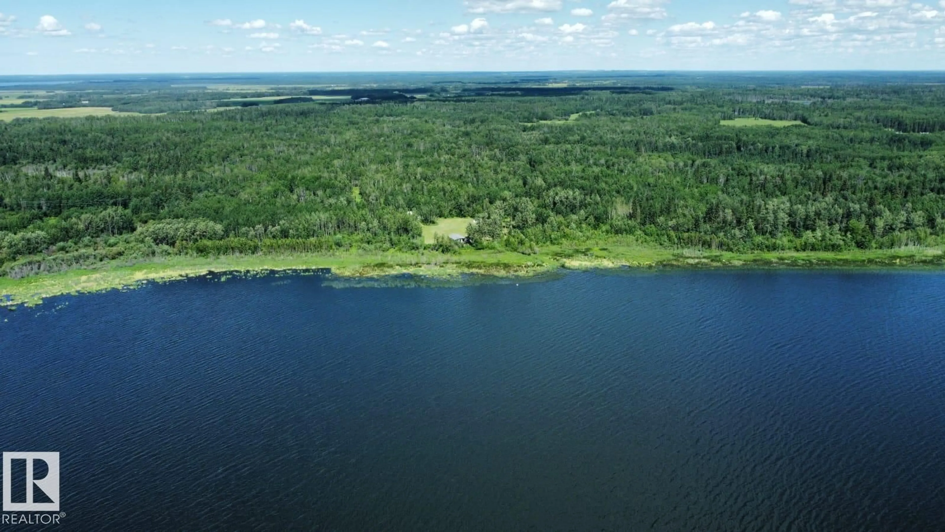 A pic from outside/outdoor area/front of a property/back of a property/a pic from drone, water/lake/river/ocean view for 191027A TWP RD 653 RD, Rural Athabasca County Alberta T8T0E4