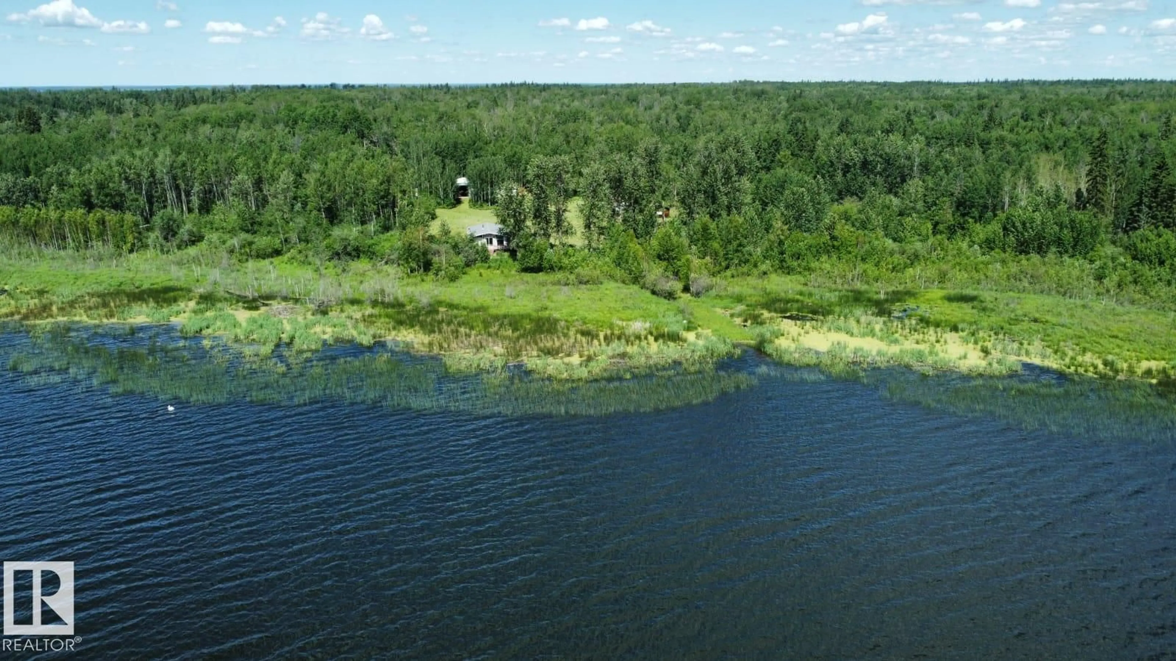 A pic from outside/outdoor area/front of a property/back of a property/a pic from drone, water/lake/river/ocean view for 191027A TWP RD 653 RD, Rural Athabasca County Alberta T8T0E4