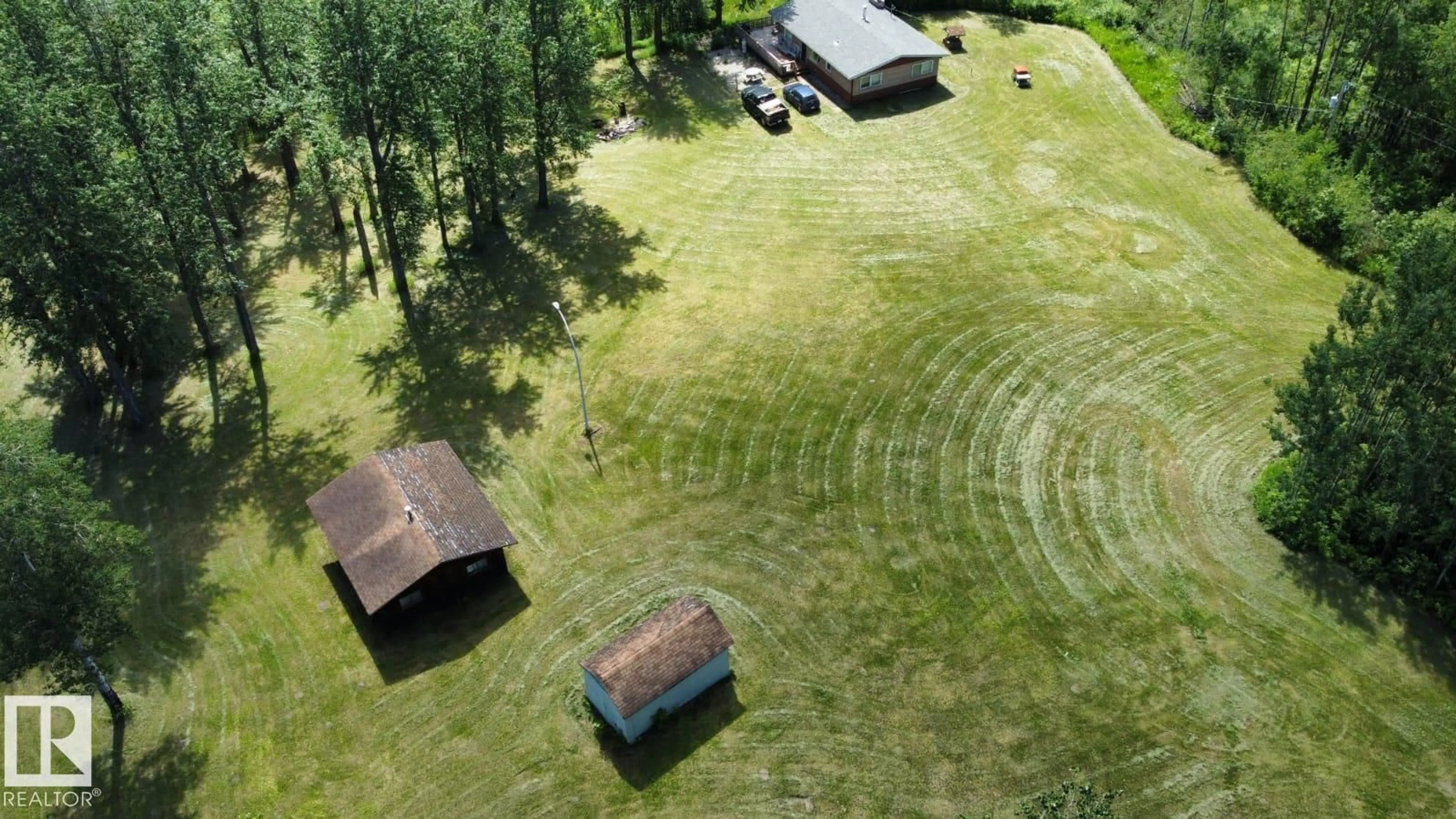 A pic from outside/outdoor area/front of a property/back of a property/a pic from drone, unknown for 191027A TWP RD 653 RD, Rural Athabasca County Alberta T8T0E4
