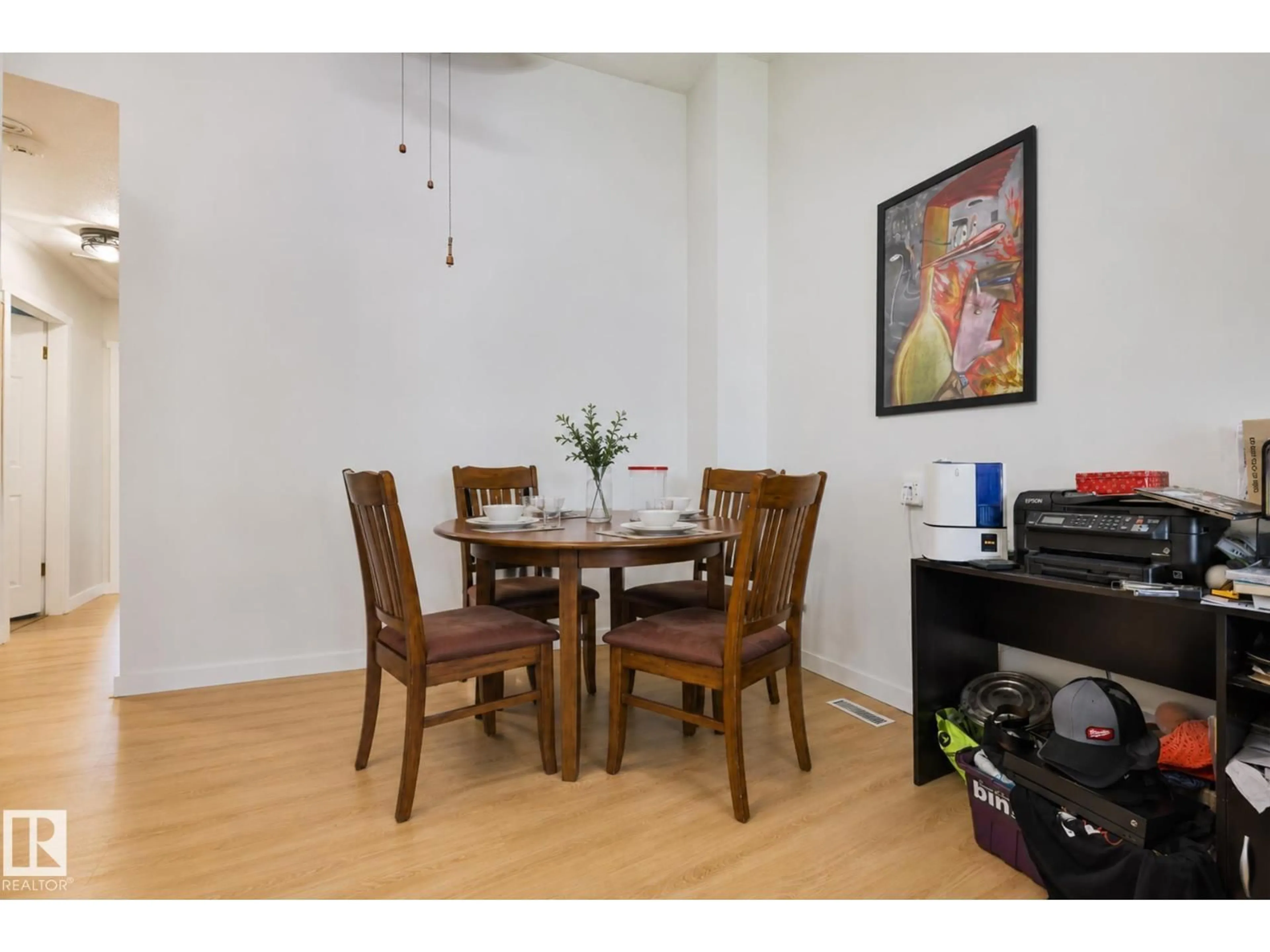 Dining room, wood/laminate floor for 11507 40 AV, Edmonton Alberta T6J0R3
