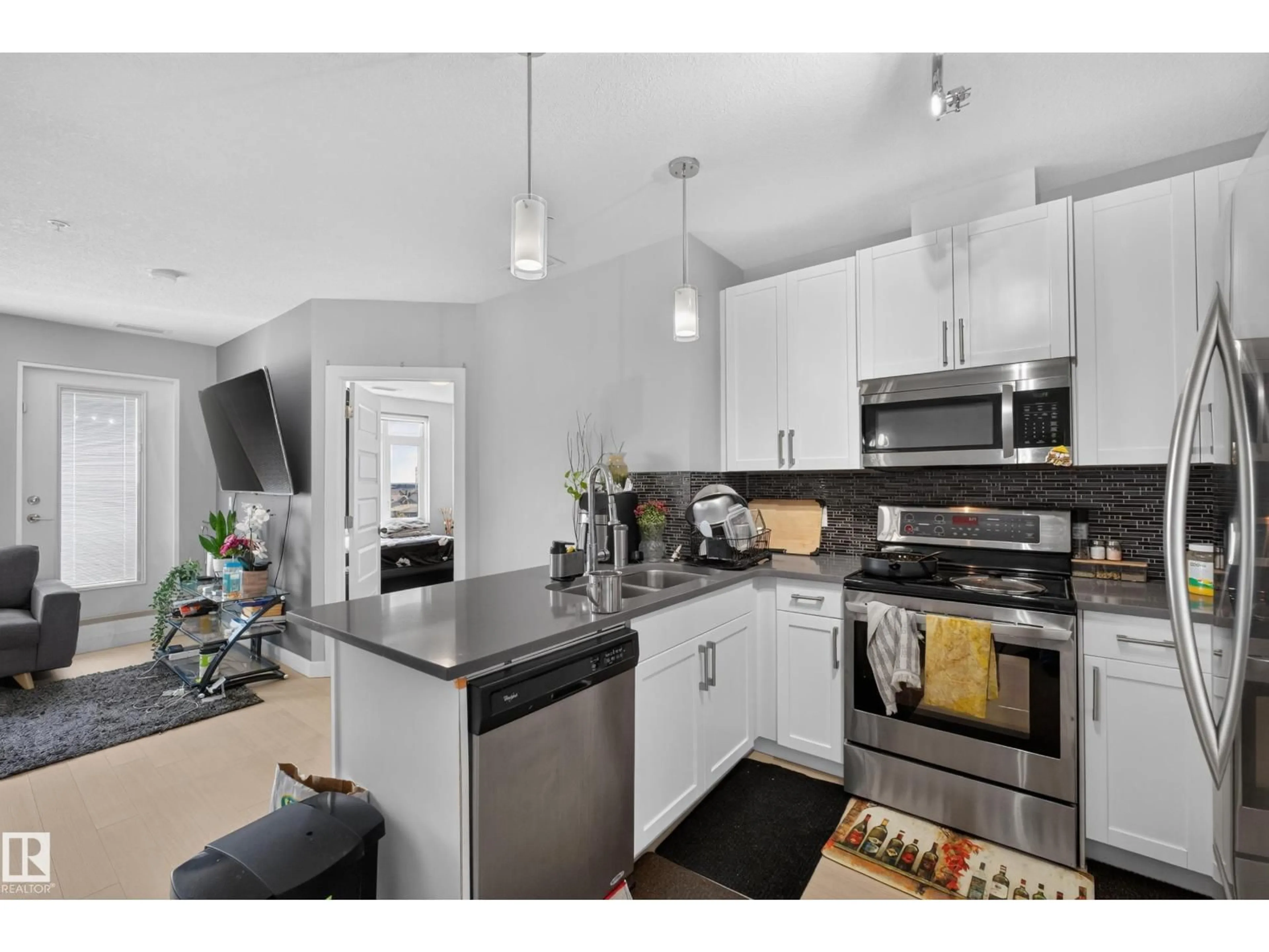 Open concept kitchen, unknown for 706 - 5151 WINDERMERE BV, Edmonton Alberta T6W2K4