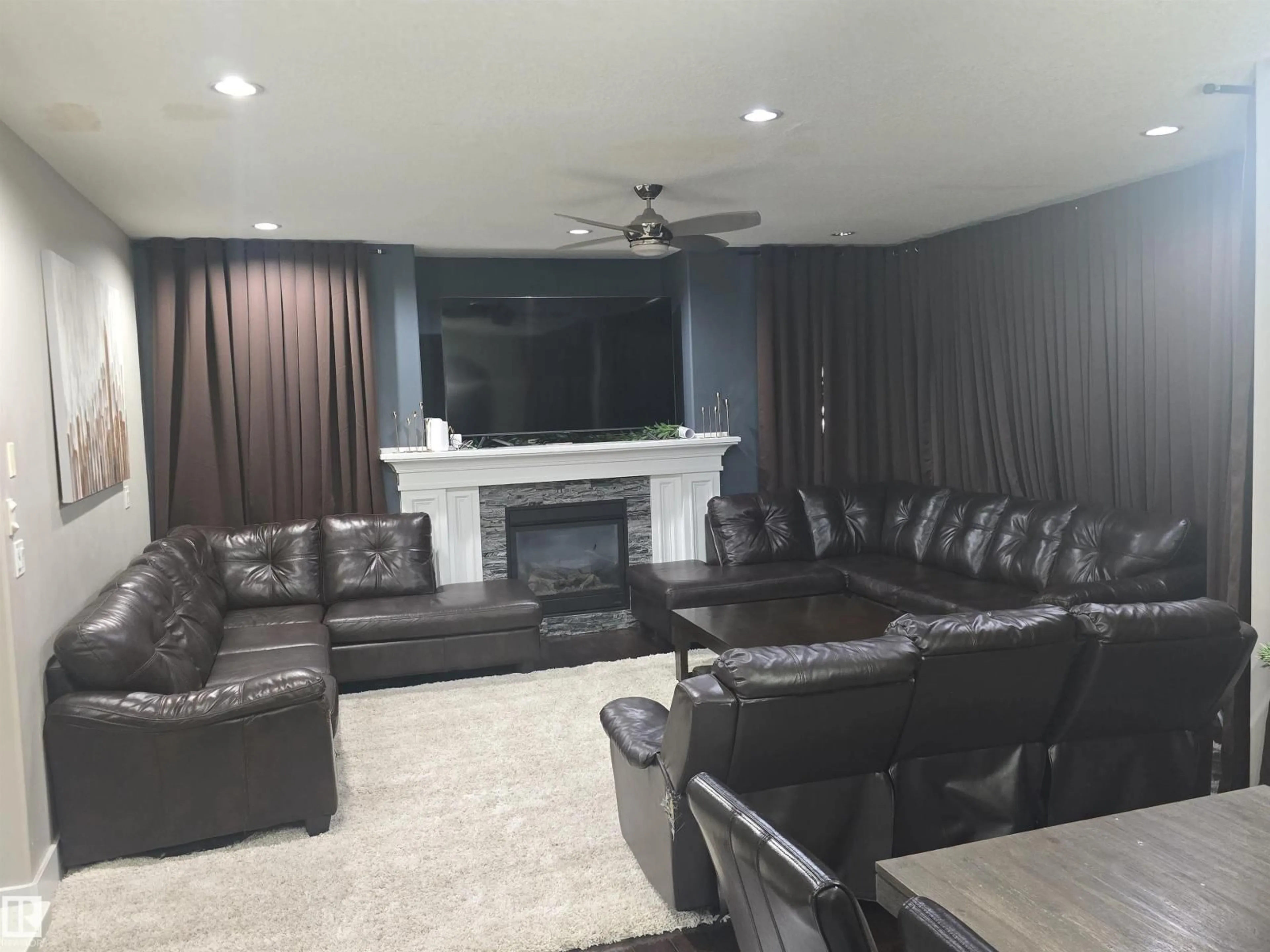 Living room with furniture, unknown for SW - 1019 175 ST, Edmonton Alberta T6W1Z7