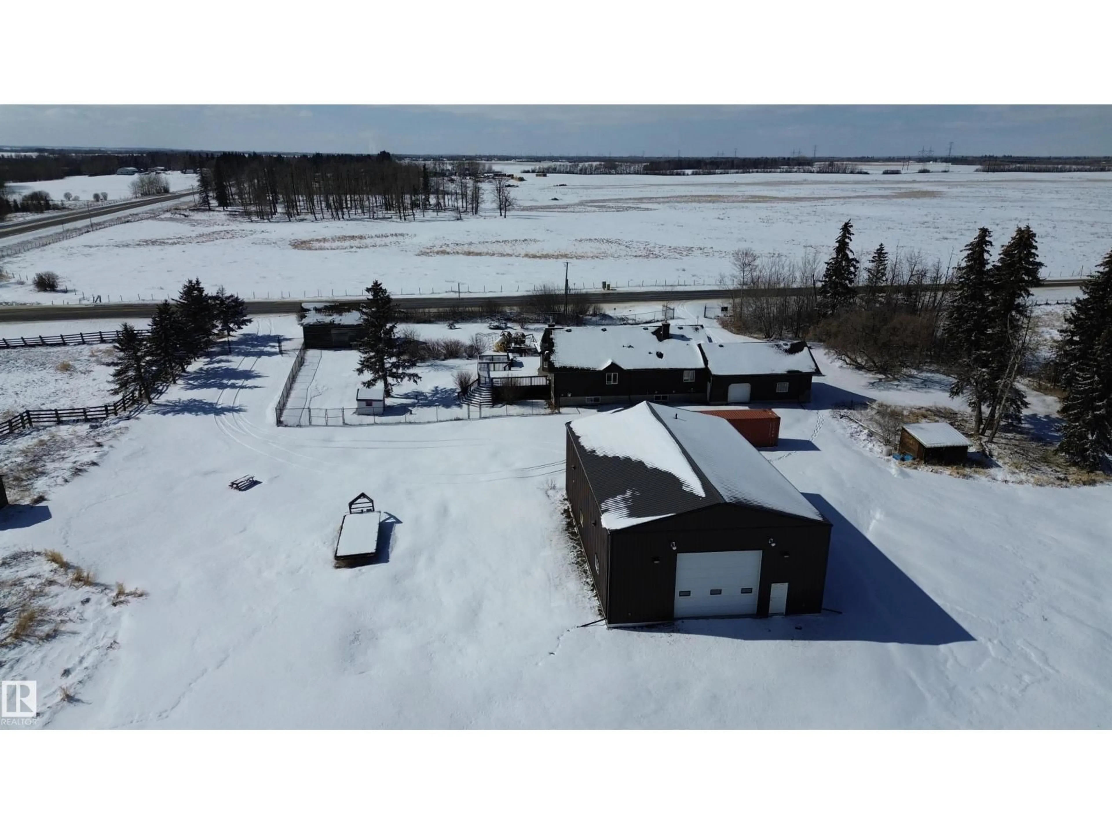 A pic from outside/outdoor area/front of a property/back of a property/a pic from drone, building for 52003 RGE ROAD 273, Rural Parkland County Alberta T7X3R7