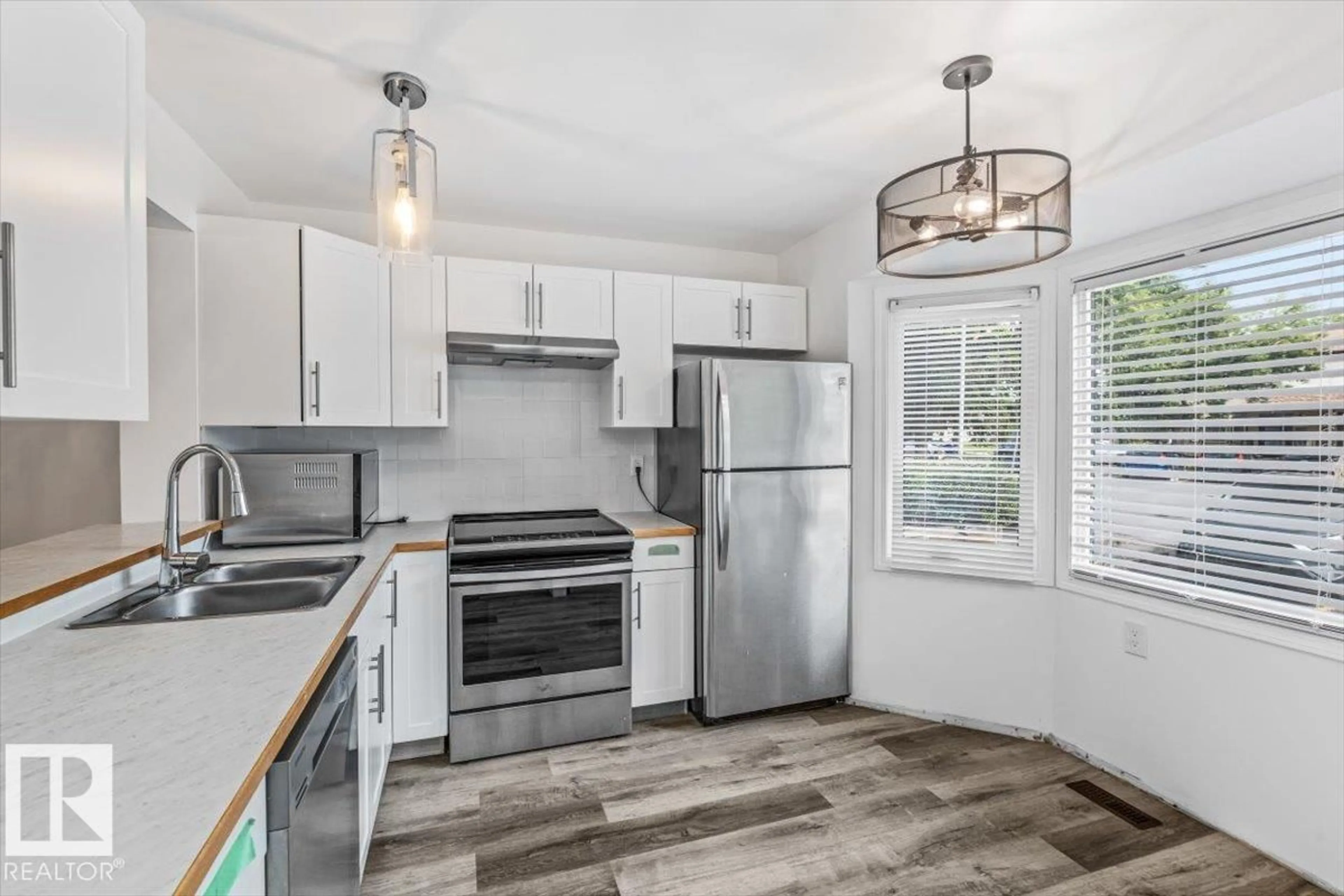 Open concept kitchen, unknown for NW - 2135 141 AV, Edmonton Alberta T5Y1C4