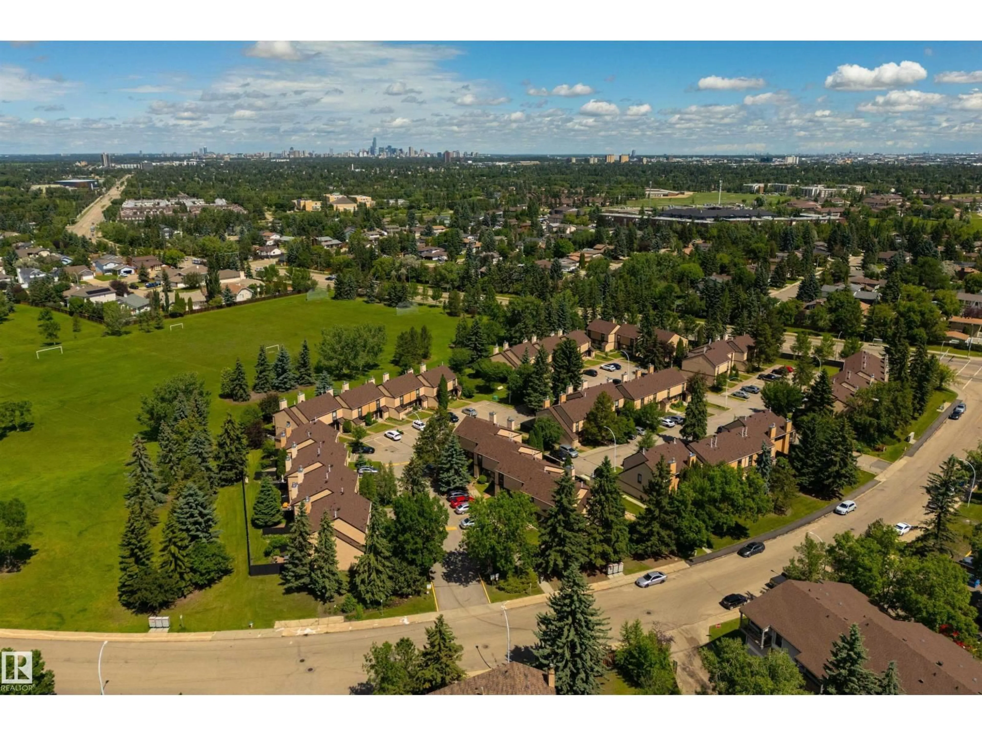 A pic from outside/outdoor area/front of a property/back of a property/a pic from drone, unknown for 12062 25 AV, Edmonton Alberta T6J4L3