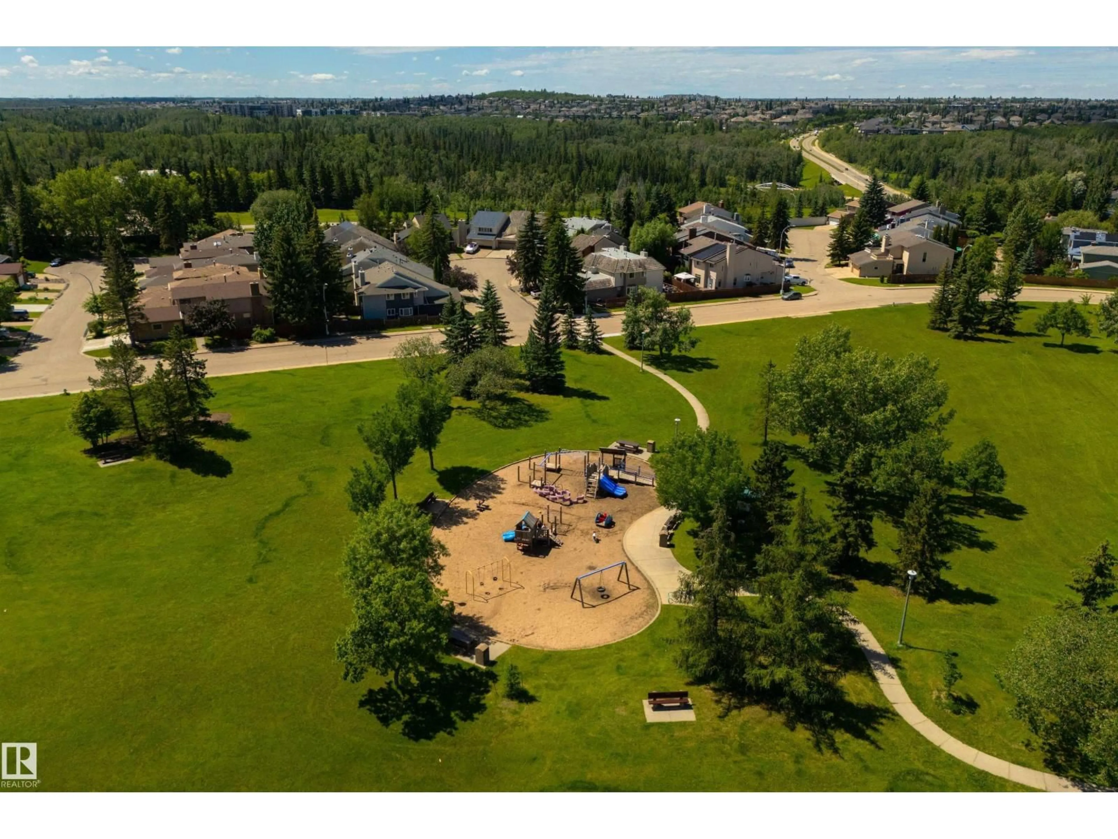 A pic from outside/outdoor area/front of a property/back of a property/a pic from drone, mountain view for 12062 25 AV, Edmonton Alberta T6J4L3