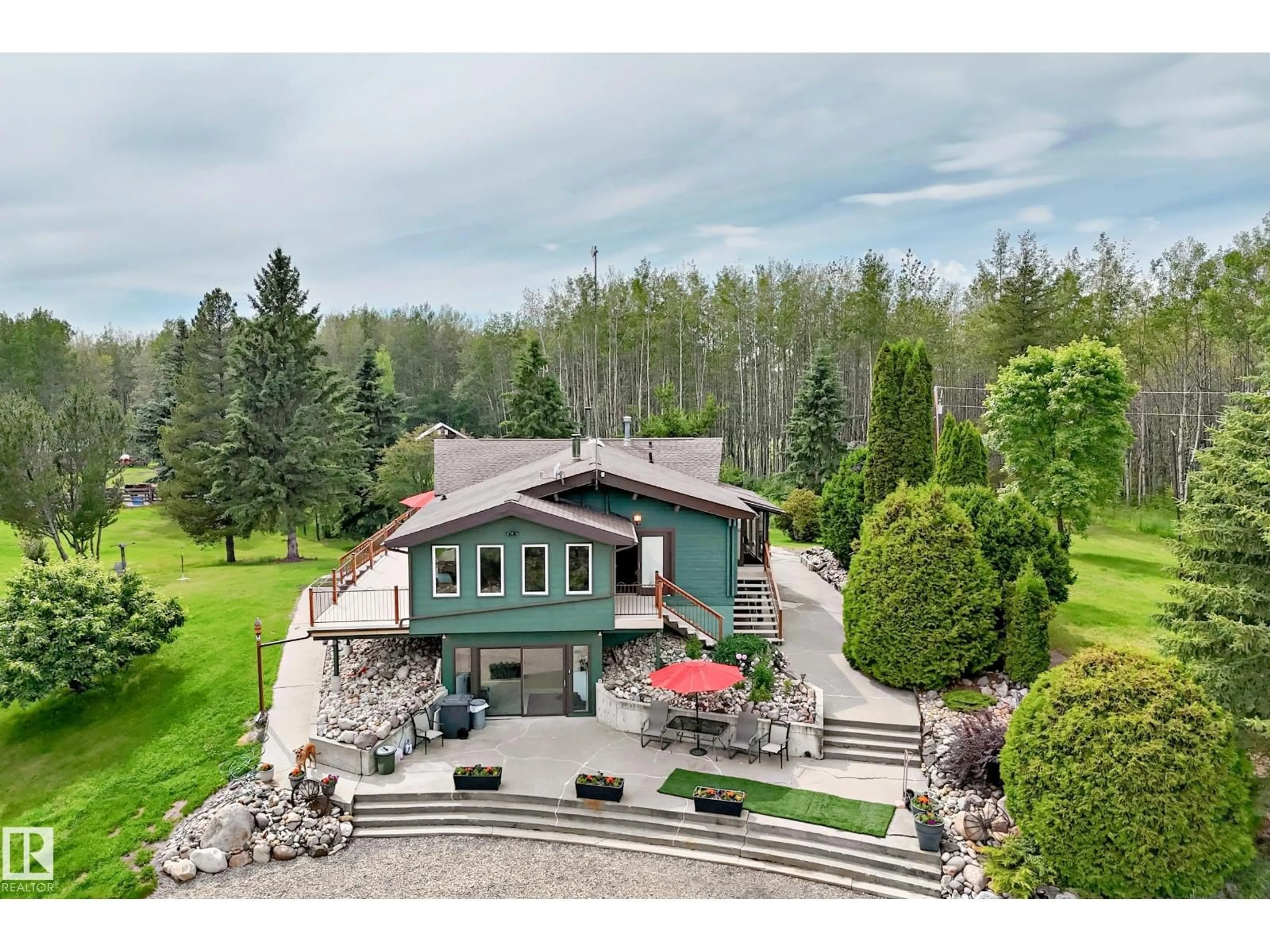 A pic from outside/outdoor area/front of a property/back of a property/a pic from drone, mountain view for 52110 & 52112 HGHWAY 759, Rural Parkland County Alberta T0E2H0