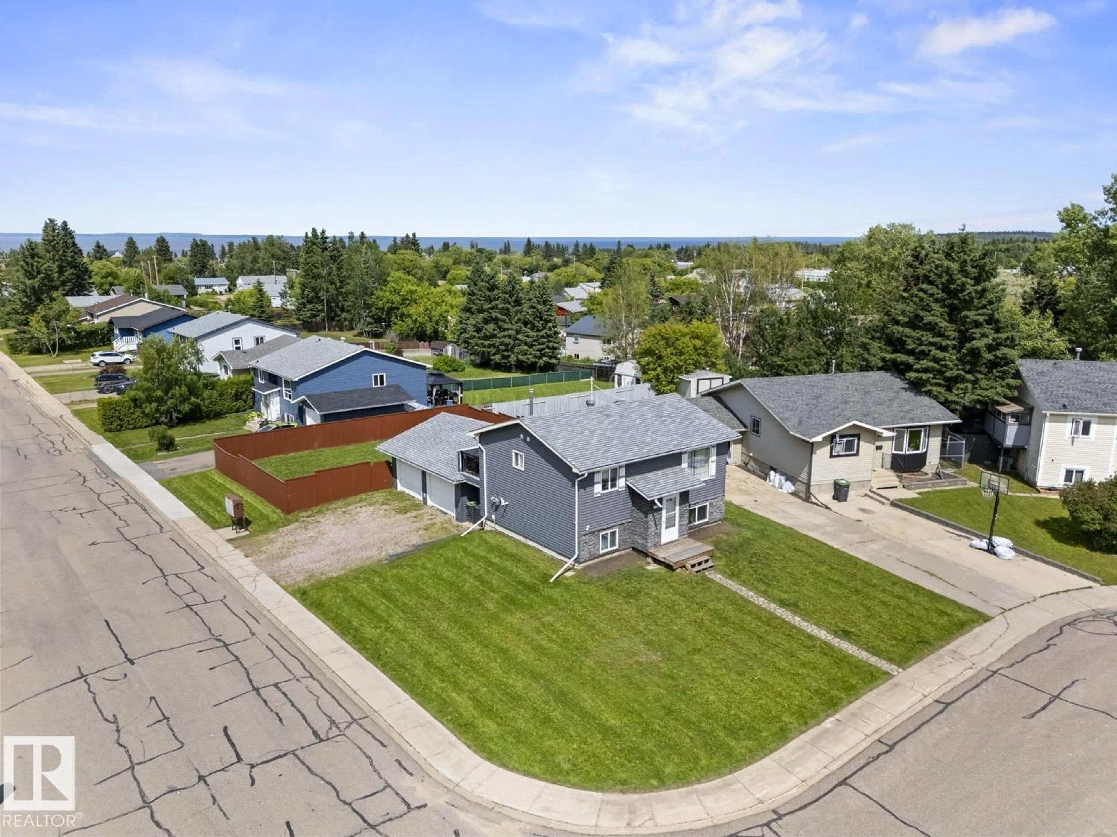 A pic from outside/outdoor area/front of a property/back of a property/a pic from drone, street for 1802 12 ST, Cold Lake Alberta T9M1L8