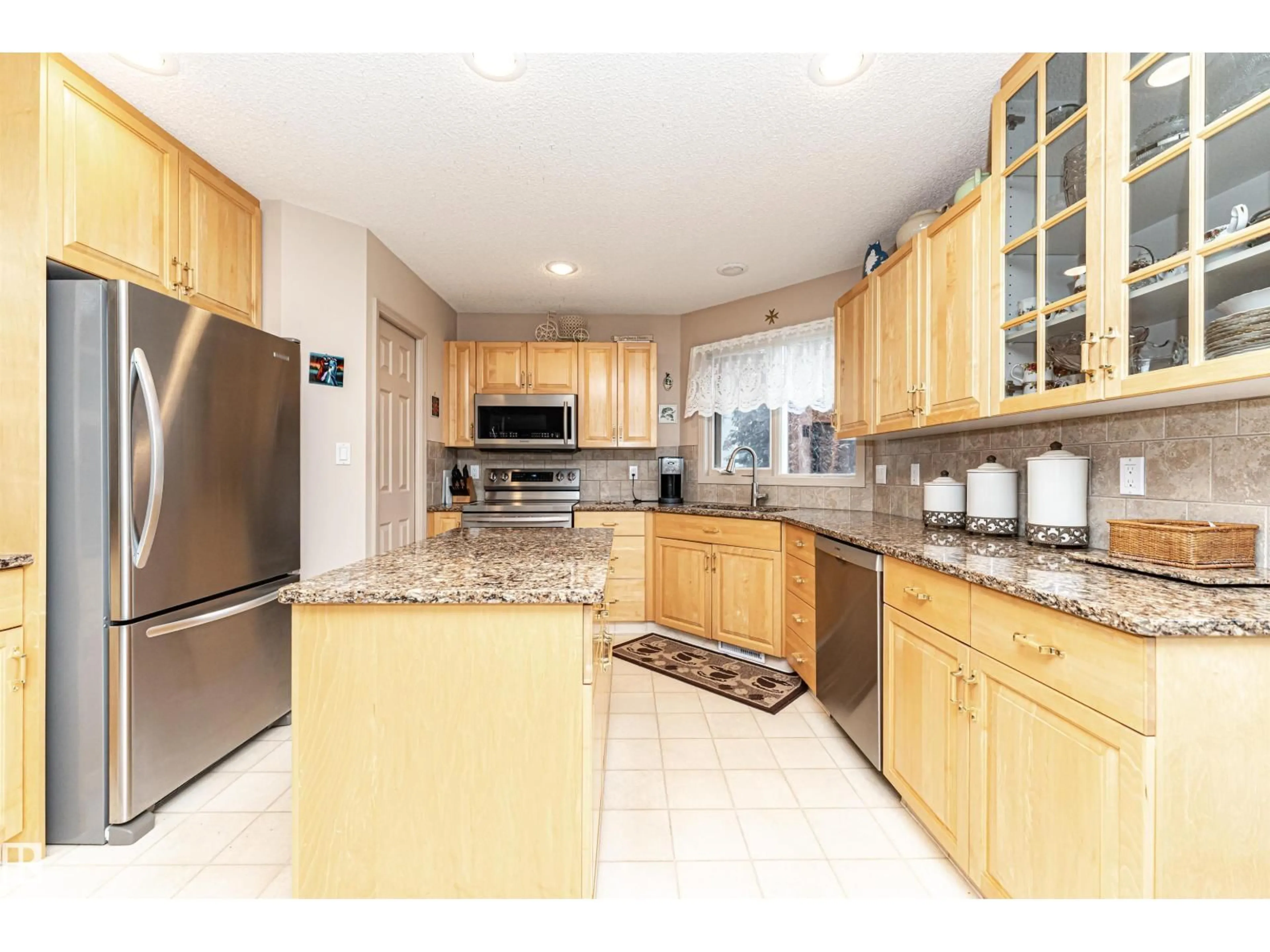 Open concept kitchen, ceramic/tile floor for 146 TWIN BROOKS CV, Edmonton Alberta T6J6Y2