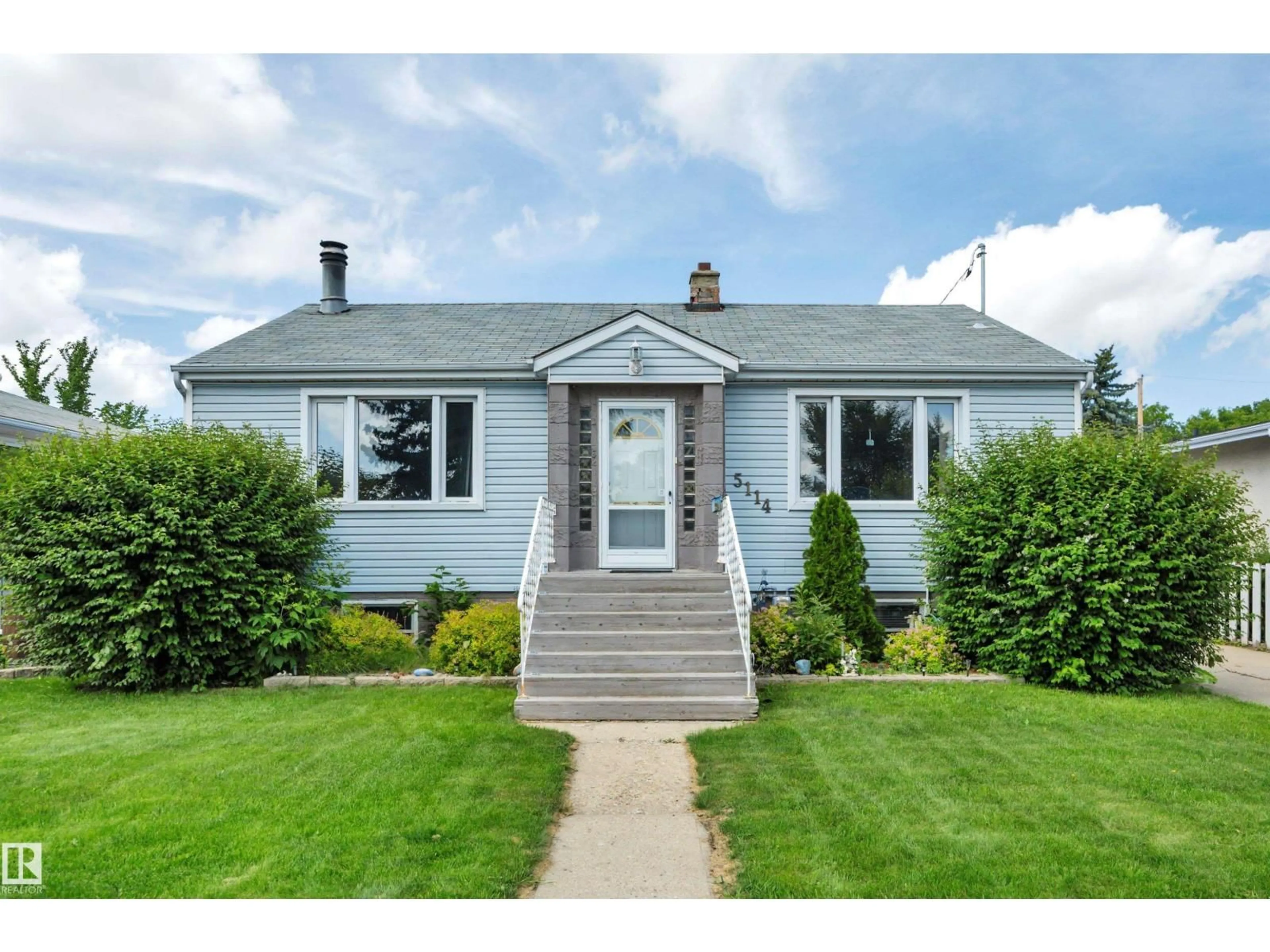 Home with vinyl exterior material, street for 5114 47 AV, Leduc Alberta T9E5C5