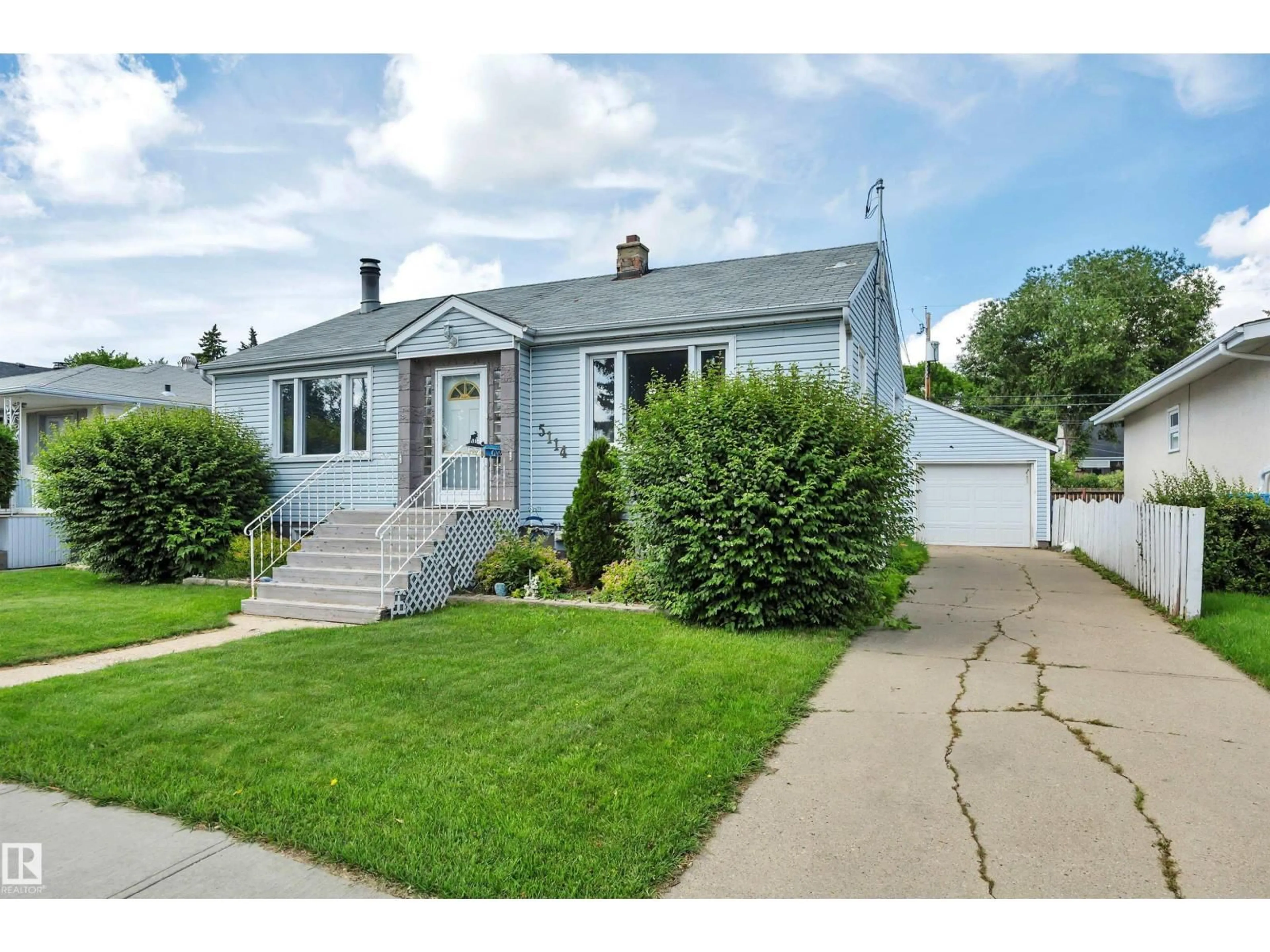 Home with vinyl exterior material, street for 5114 47 AV, Leduc Alberta T9E5C5