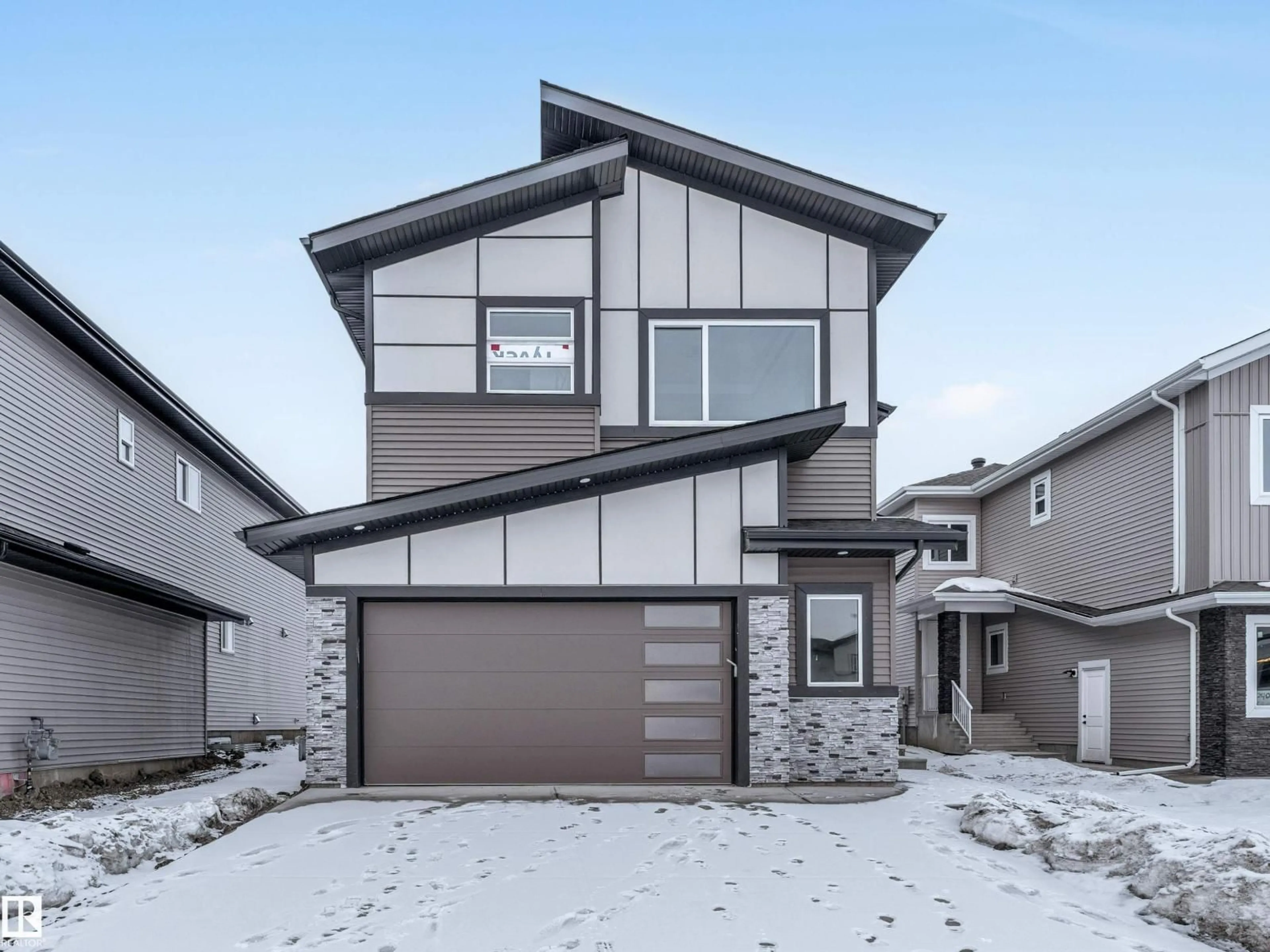 Home with vinyl exterior material, street for NE - 2346 63 AV, Rural Leduc County Alberta T4X3A6