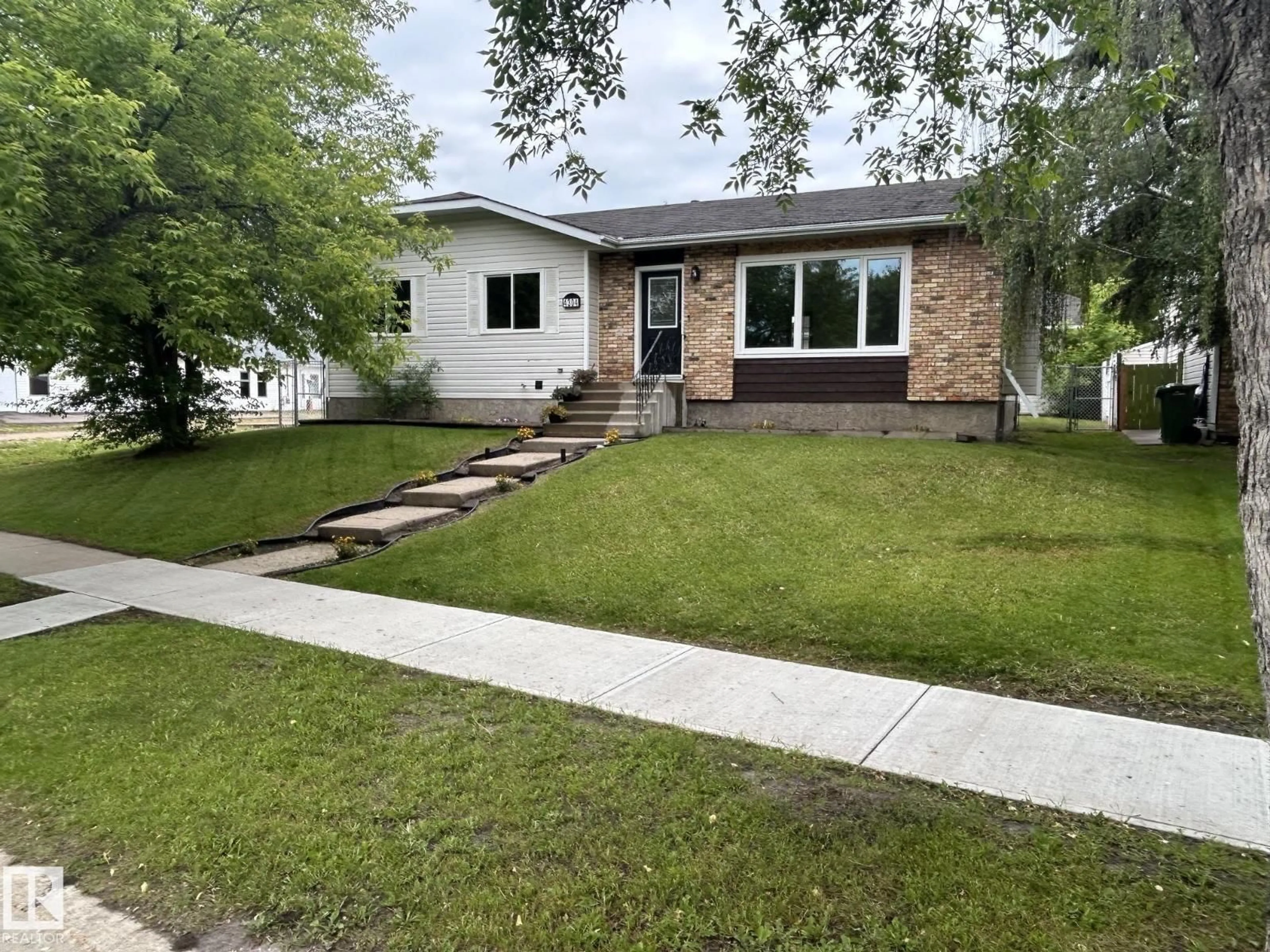 Home with vinyl exterior material, street for 4304 41A ST, Bonnyville Town Alberta T9N1W3