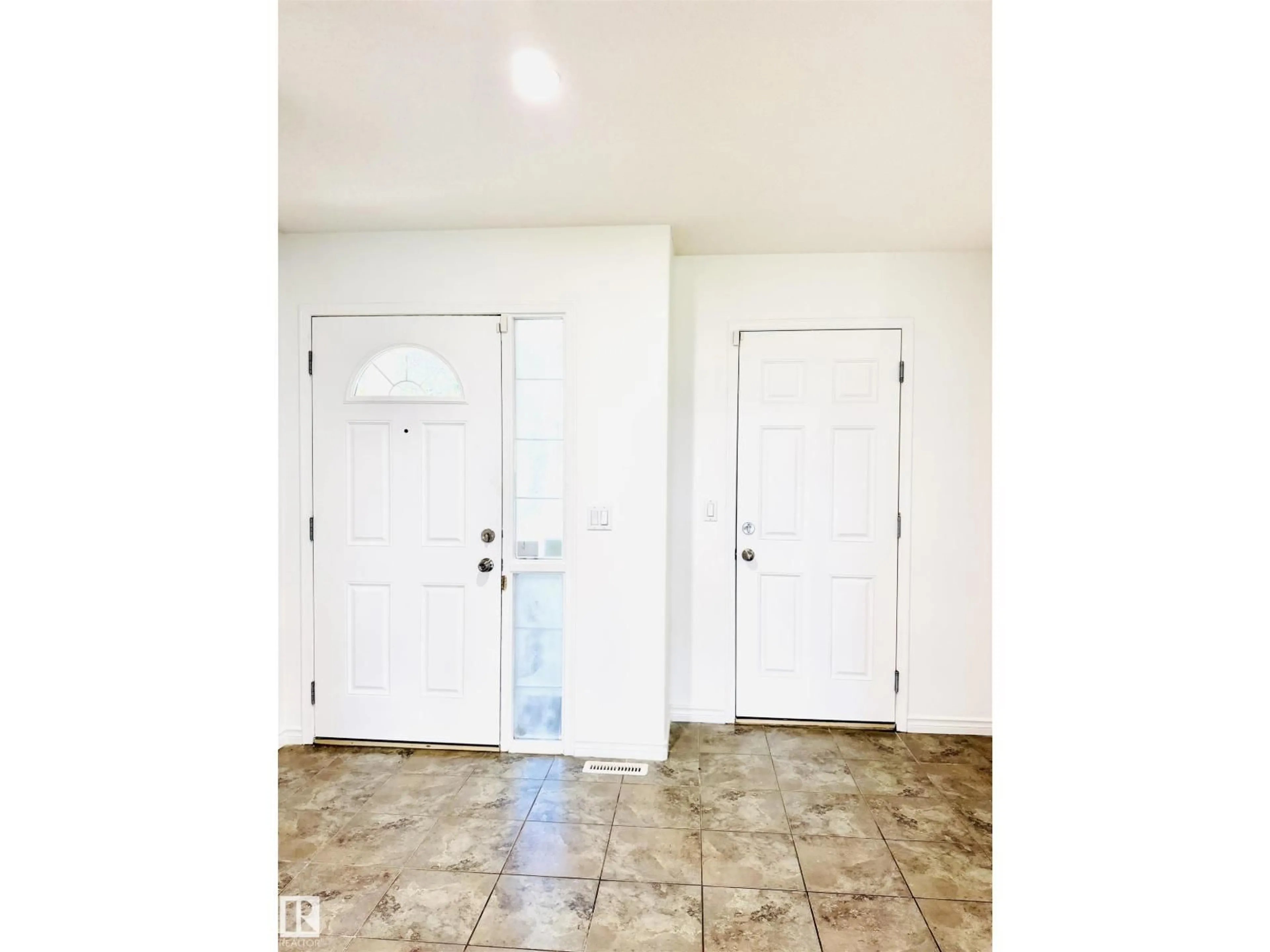Indoor entryway for 3120 25 AV, Edmonton Alberta T6T0L8