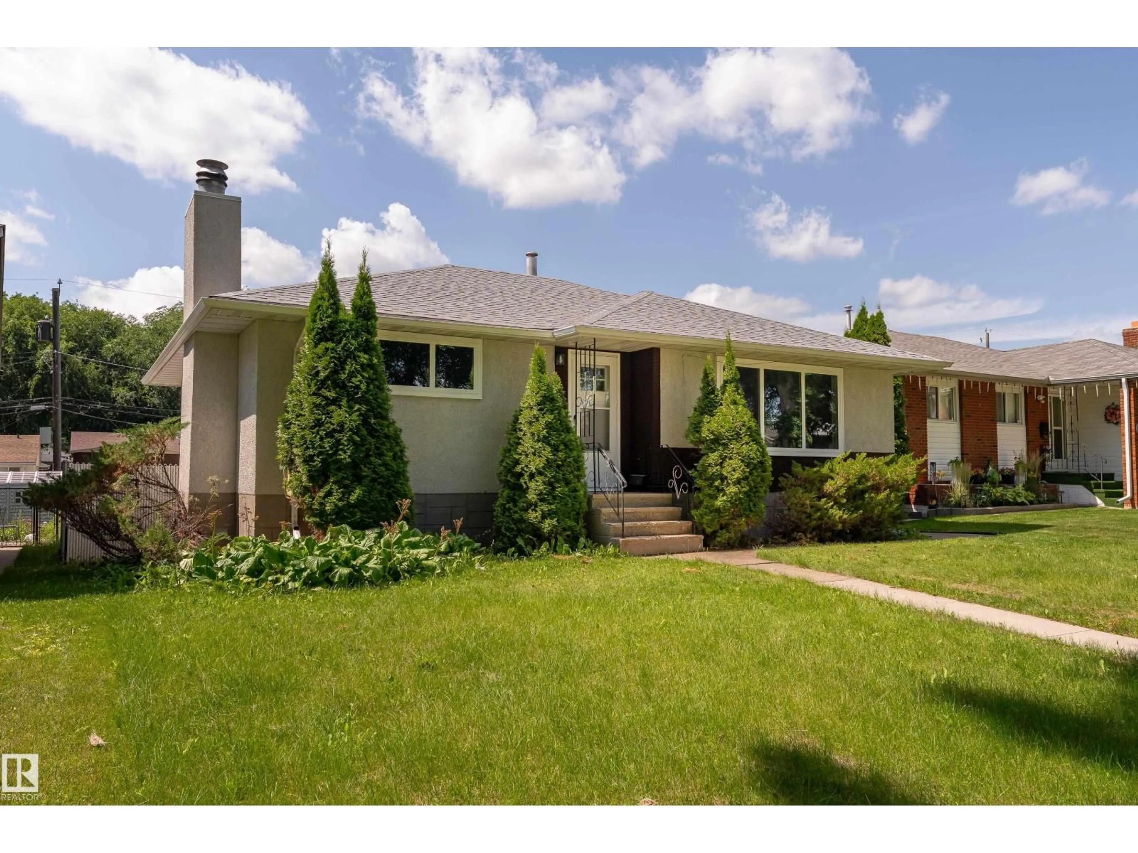 Home with brick exterior material, street for NW - 12224 55 ST, Edmonton Alberta T5W3R4