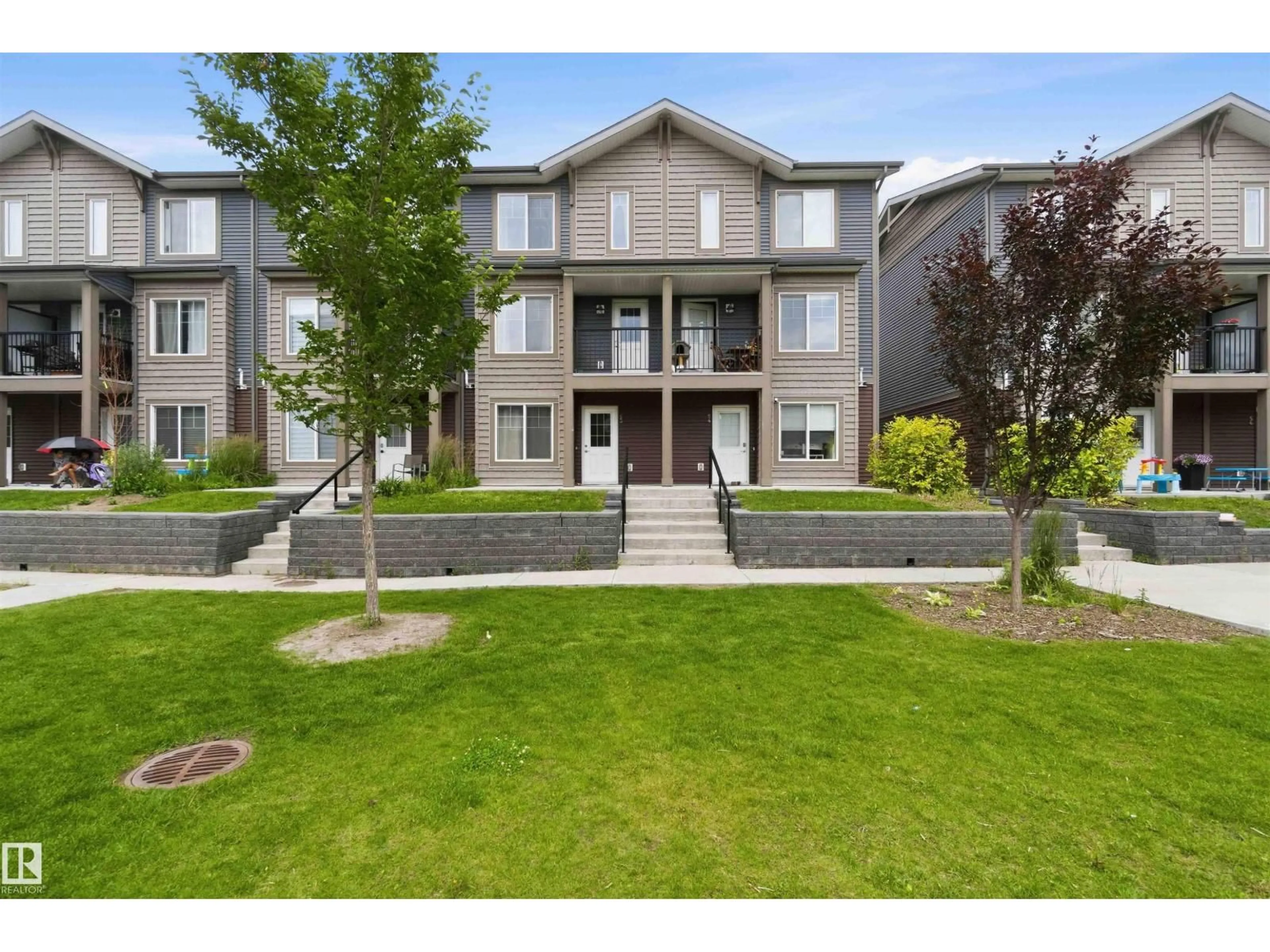 A pic from outside/outdoor area/front of a property/back of a property/a pic from drone, unknown for 53 - 3025 151 AV, Edmonton Alberta T5Y3W4