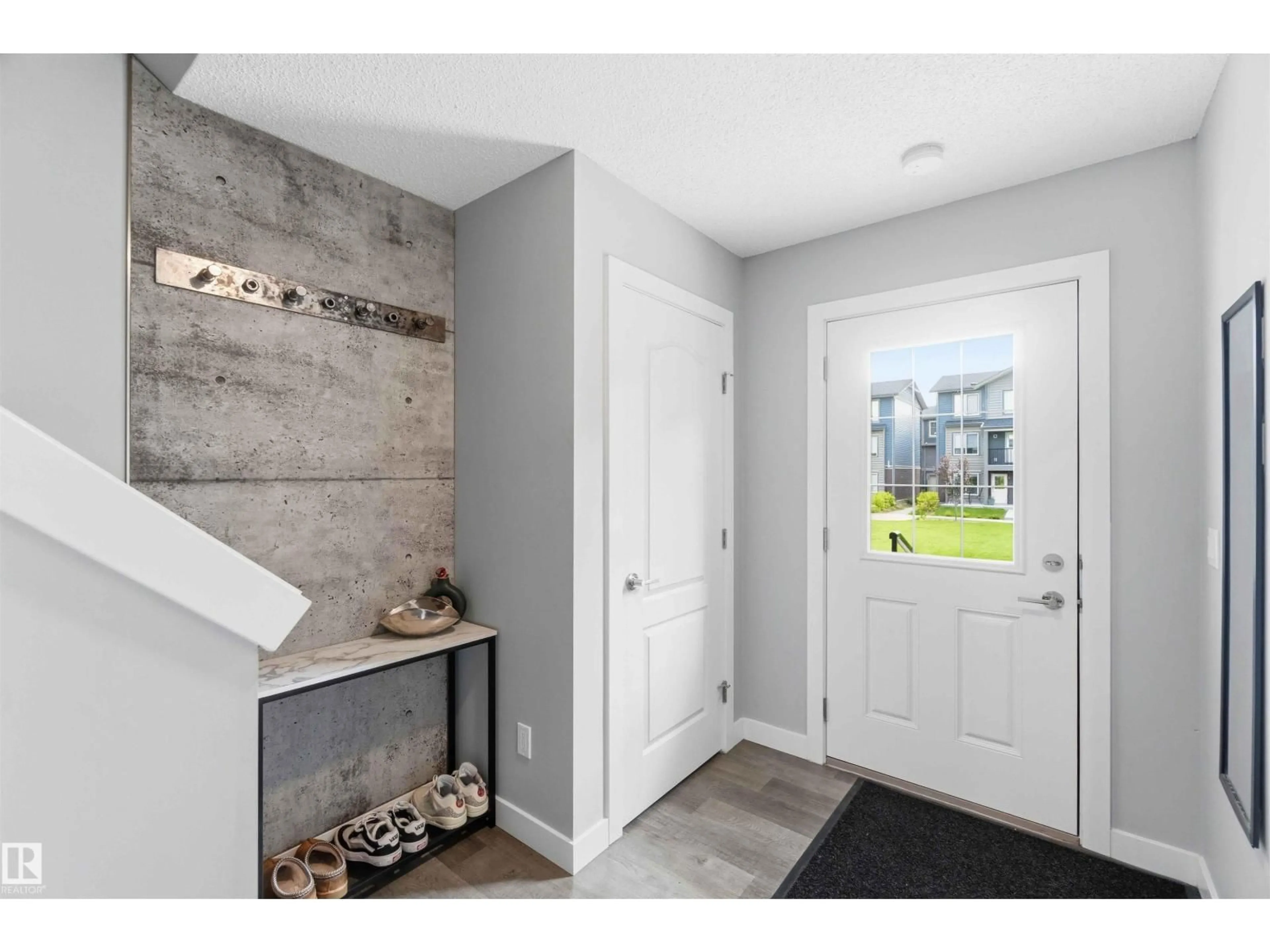 Indoor entryway for 53 - 3025 151 AV, Edmonton Alberta T5Y3W4