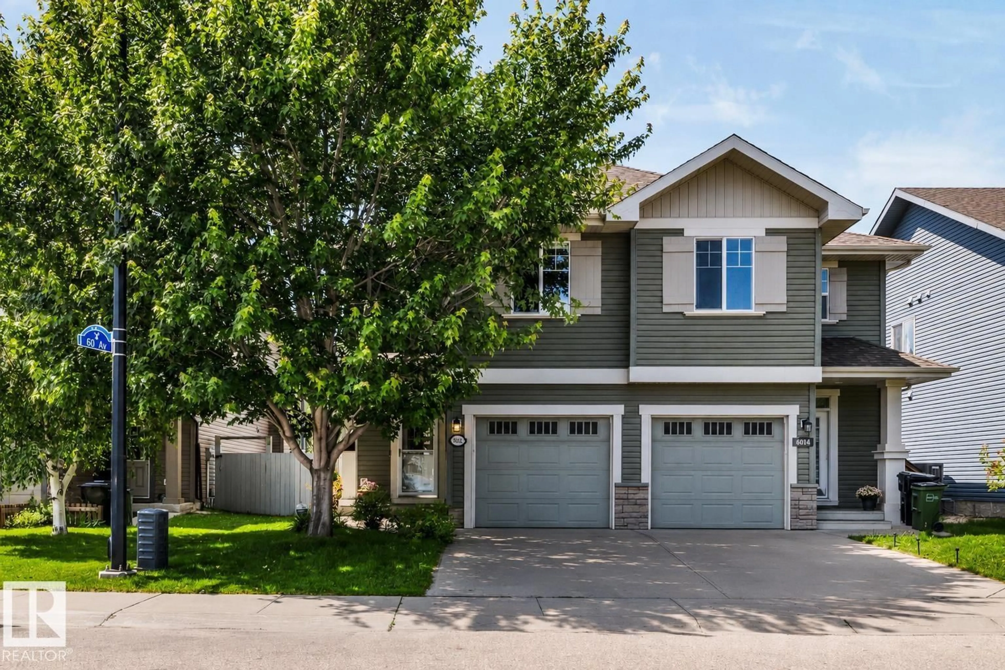 Home with vinyl exterior material, street for NW - 6012 214 ST, Edmonton Alberta T6M0H8