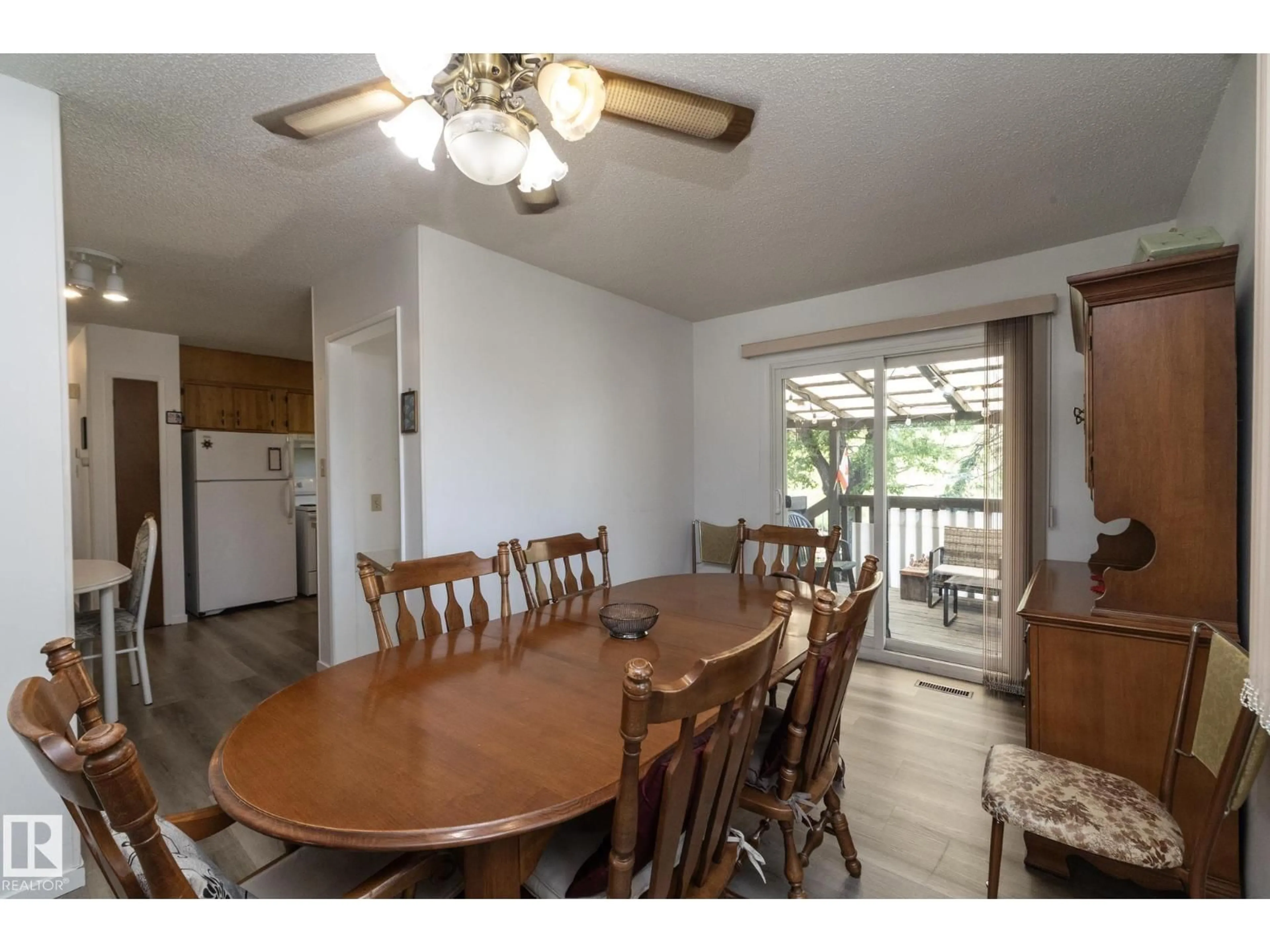 Dining room, wood/laminate floor for 4302 53 ST, Leduc Alberta T9E5B1