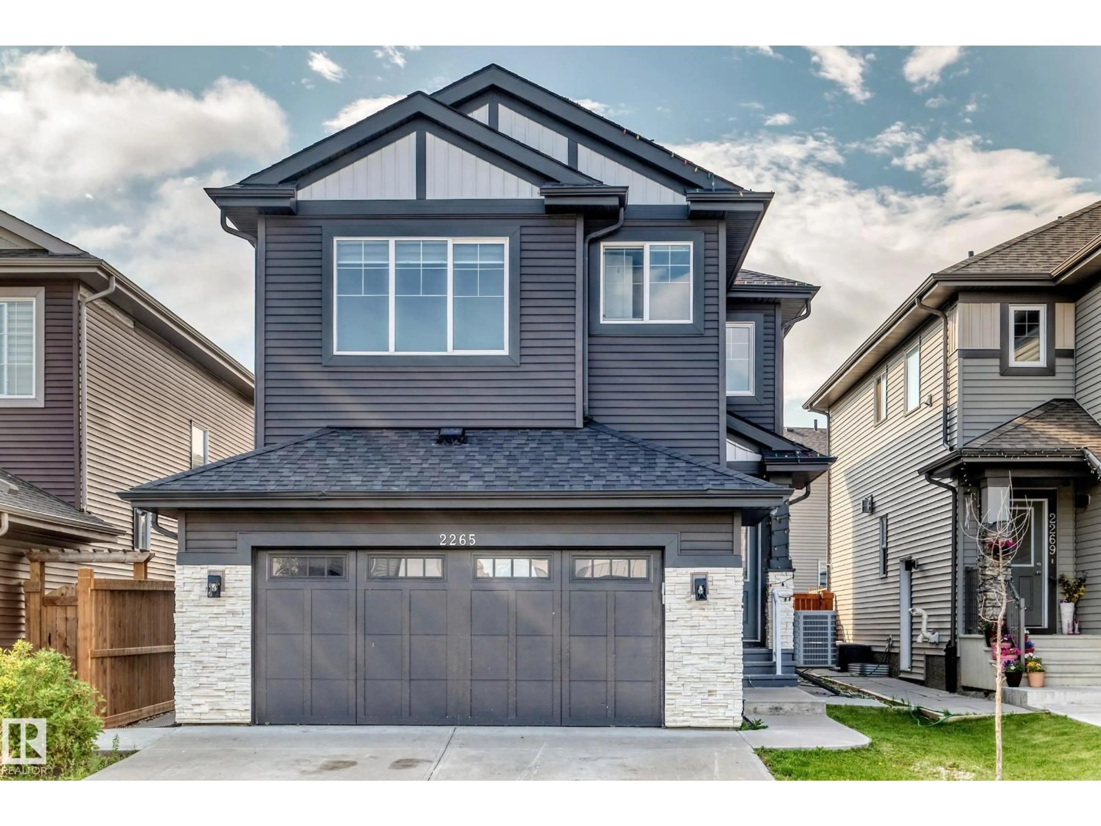 Home with vinyl exterior material, street for SW SW - 2265 57 ST, Edmonton Alberta T6X2P3
