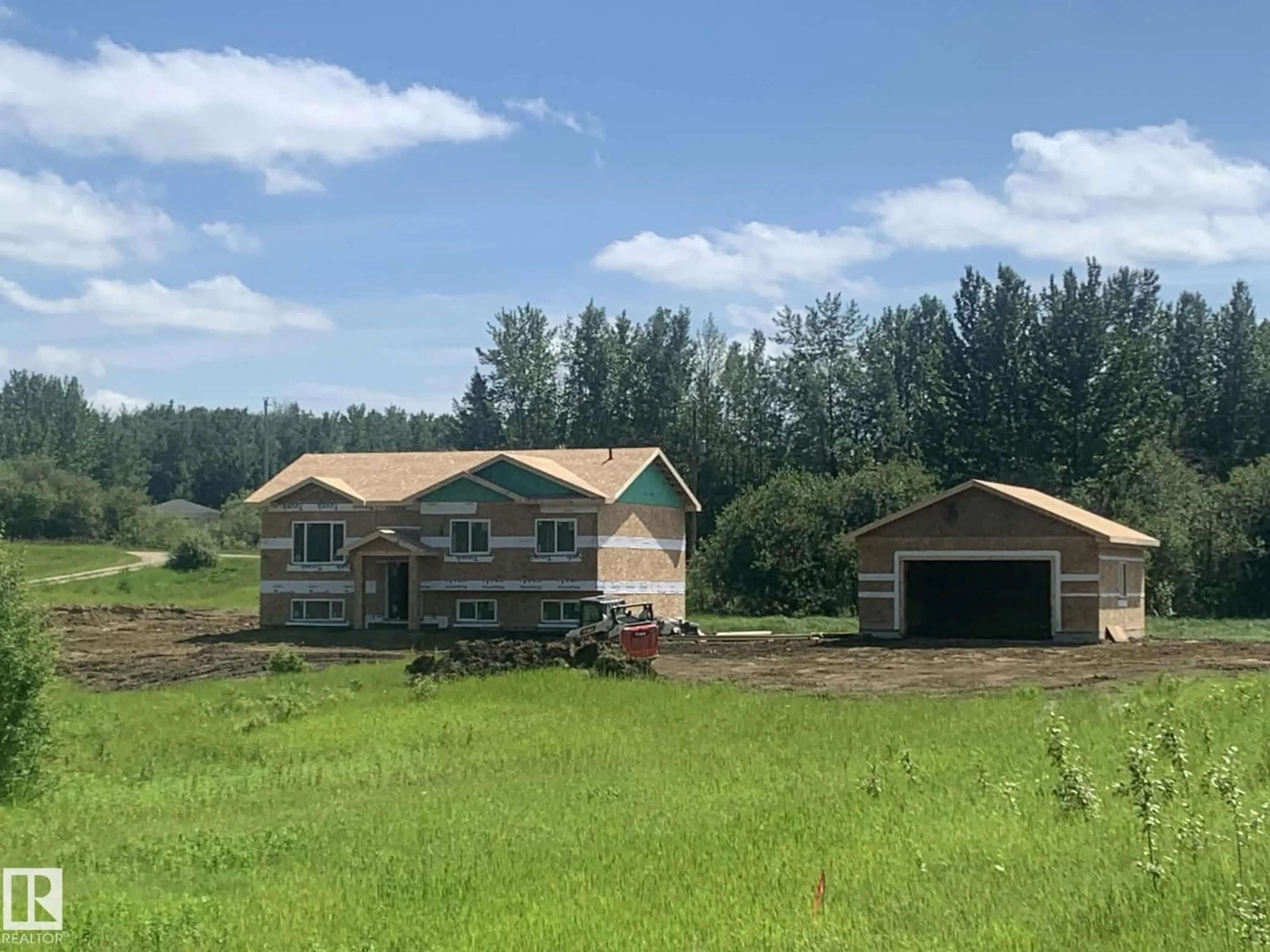 A pic from outside/outdoor area/front of a property/back of a property/a pic from drone, building for #14 - 52510 RGE ROAD 25, Rural Parkland County Alberta T7Y2M2