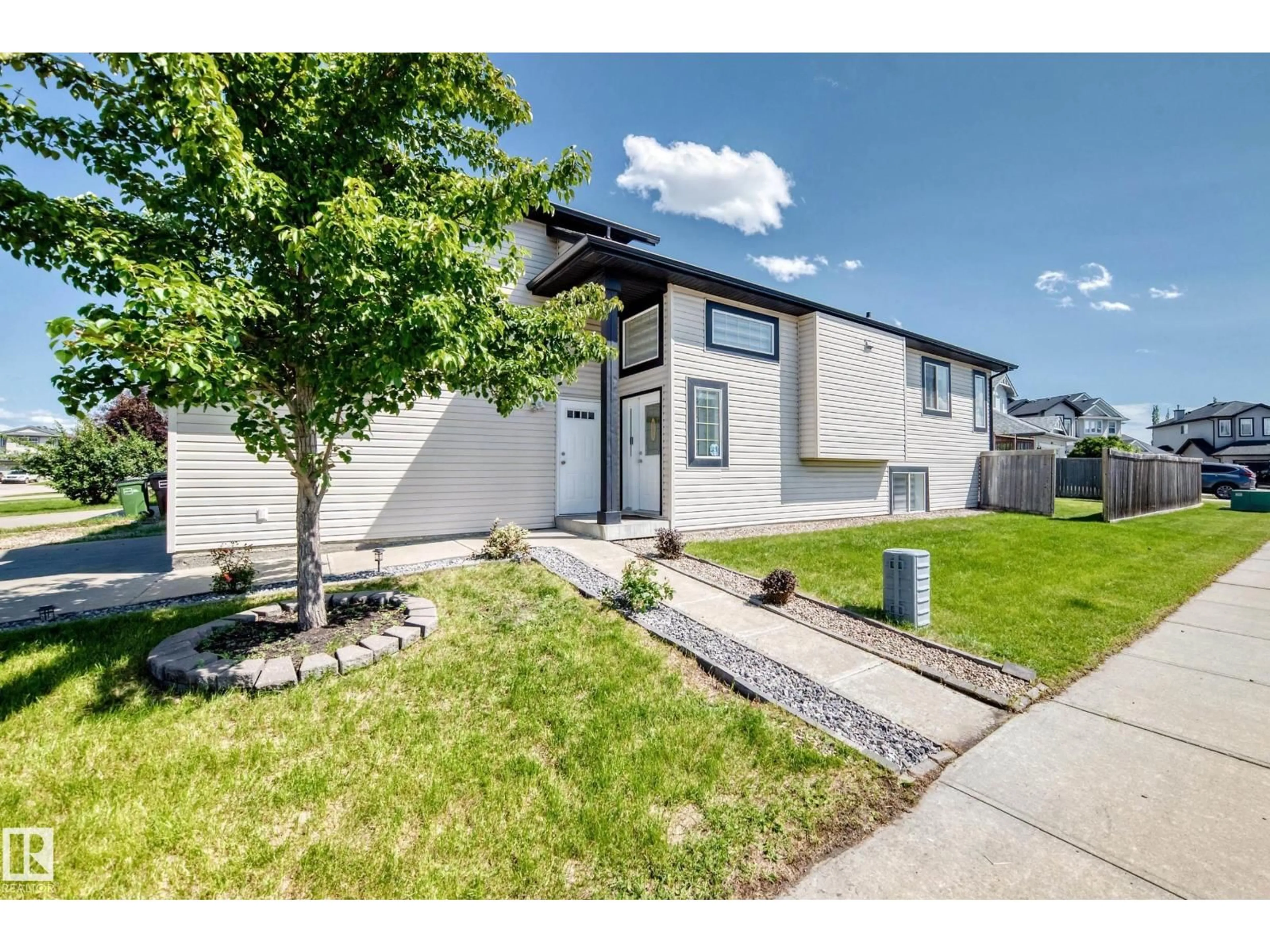 Home with vinyl exterior material, street for 11249 167A AV, Edmonton Alberta T5X0A8