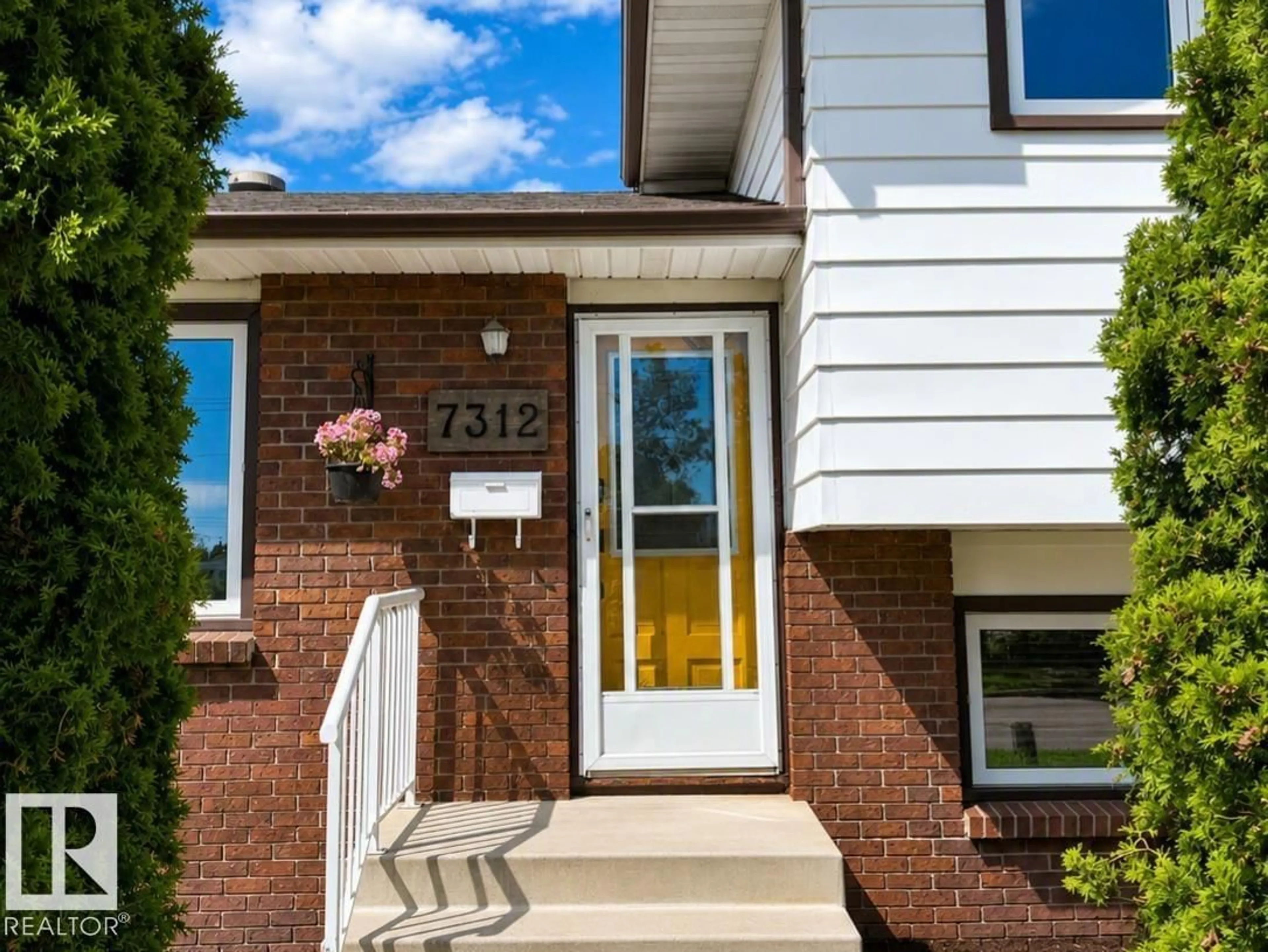 Home with brick exterior material, street for 7312 137 AV, Edmonton Alberta T5C2L5