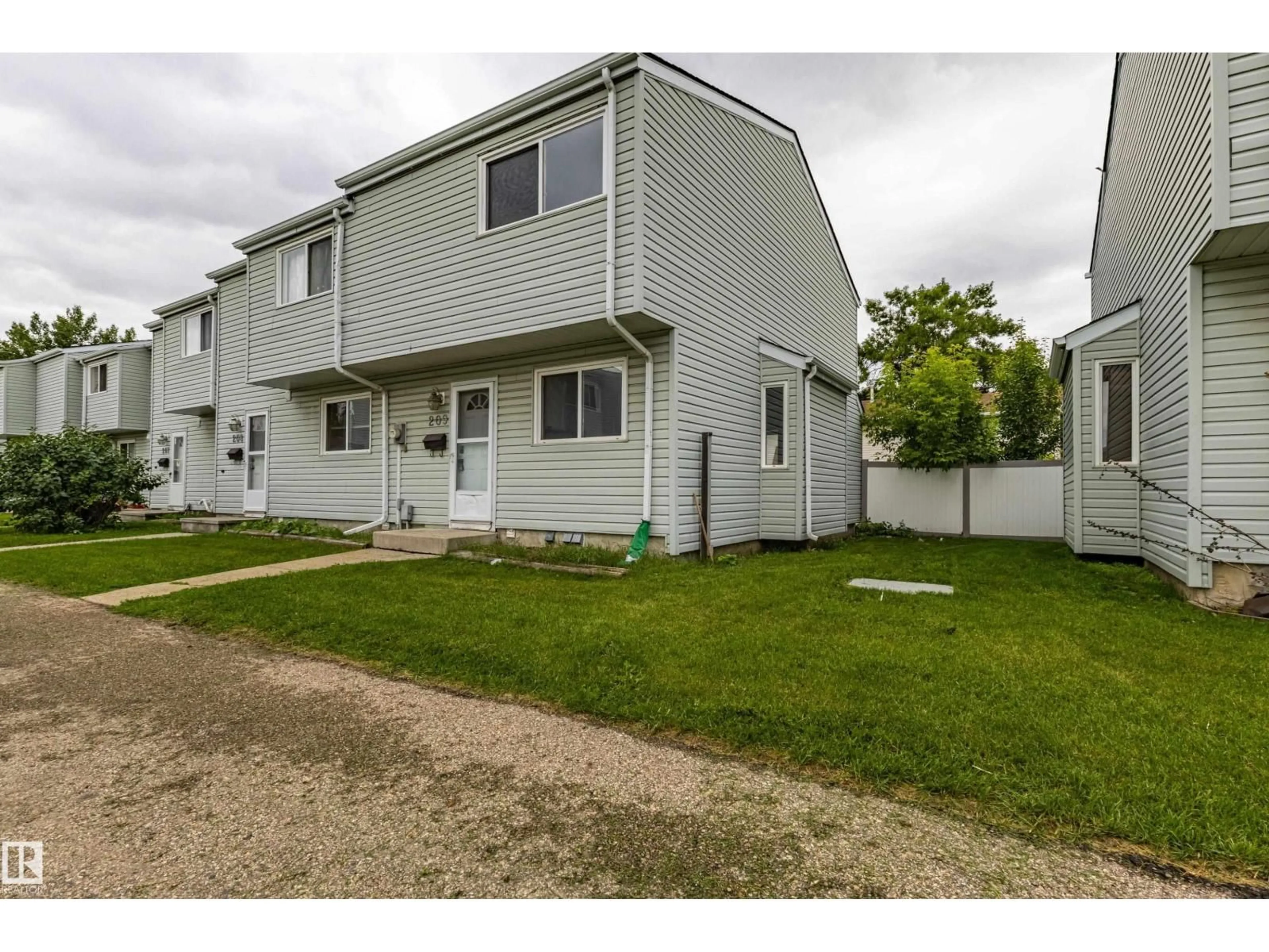 A pic from outside/outdoor area/front of a property/back of a property/a pic from drone, street for NW - 209 DICKINSFIELD CO, Edmonton Alberta T5E5V8