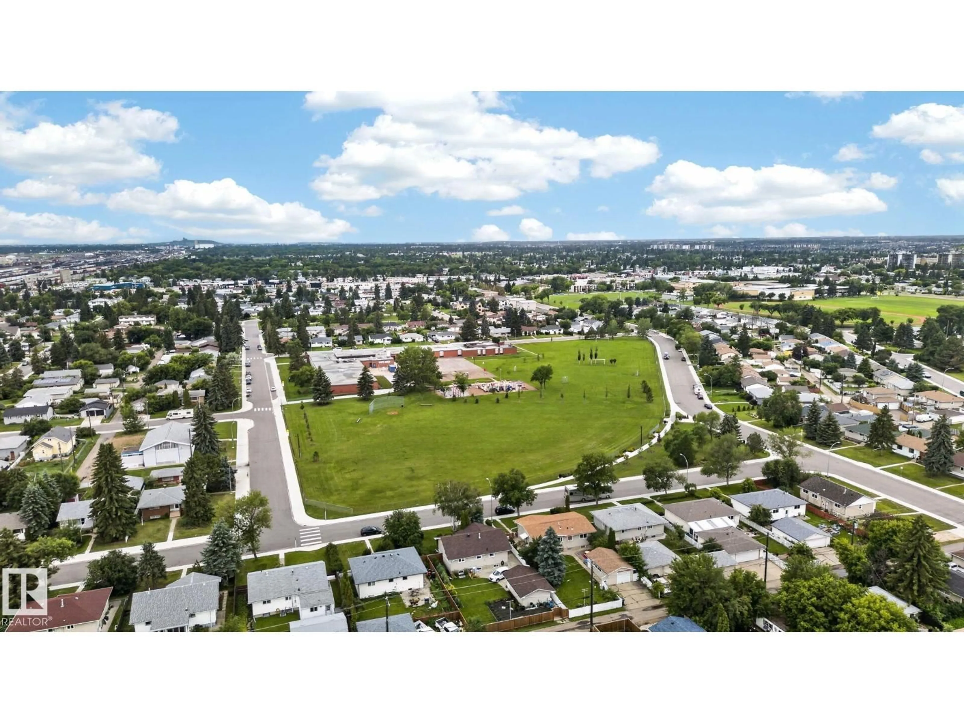 A pic from outside/outdoor area/front of a property/back of a property/a pic from drone, unknown for NW - 8614 and 8616 128 AV, Edmonton Alberta T5E0G2