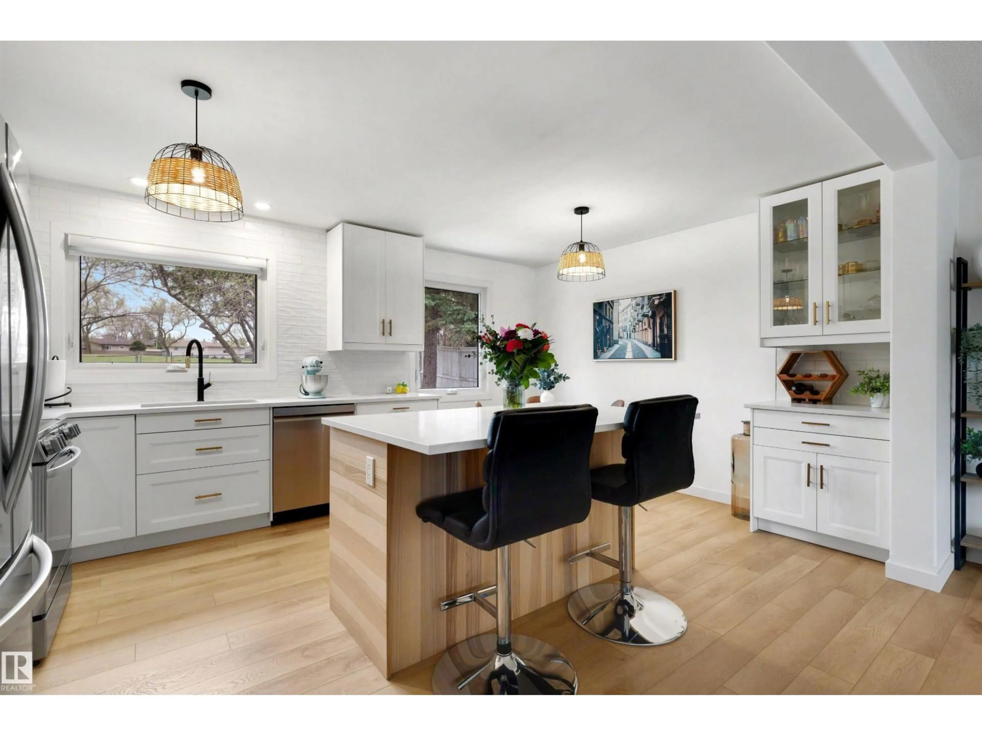 Open concept kitchen, wood/laminate floor for 9 HUMMINGBIRD RD, Sherwood Park Alberta T8A0A1