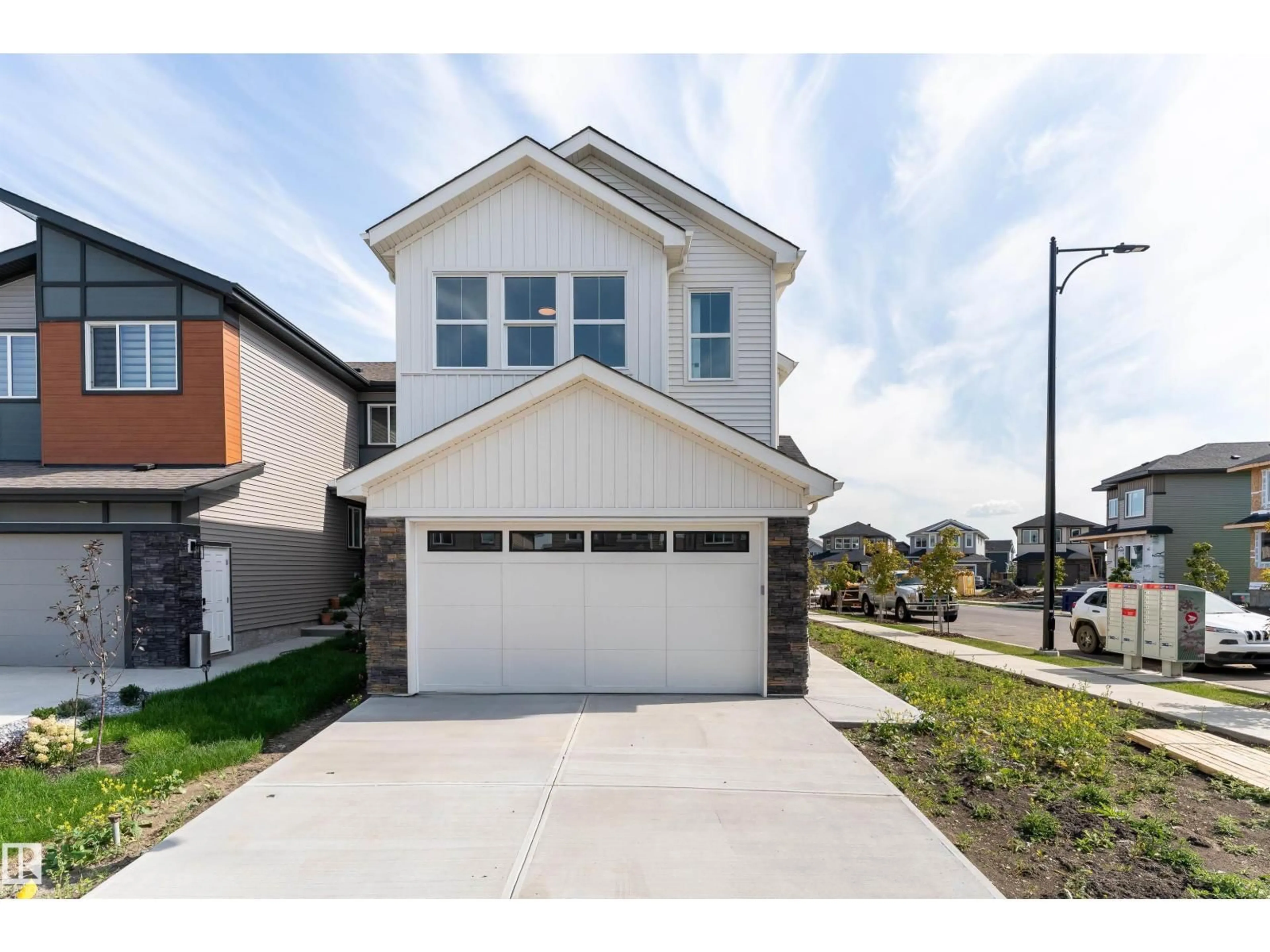 Home with brick exterior material, street for 93 ELLIOTT WD, Fort Saskatchewan Alberta T8L1R8