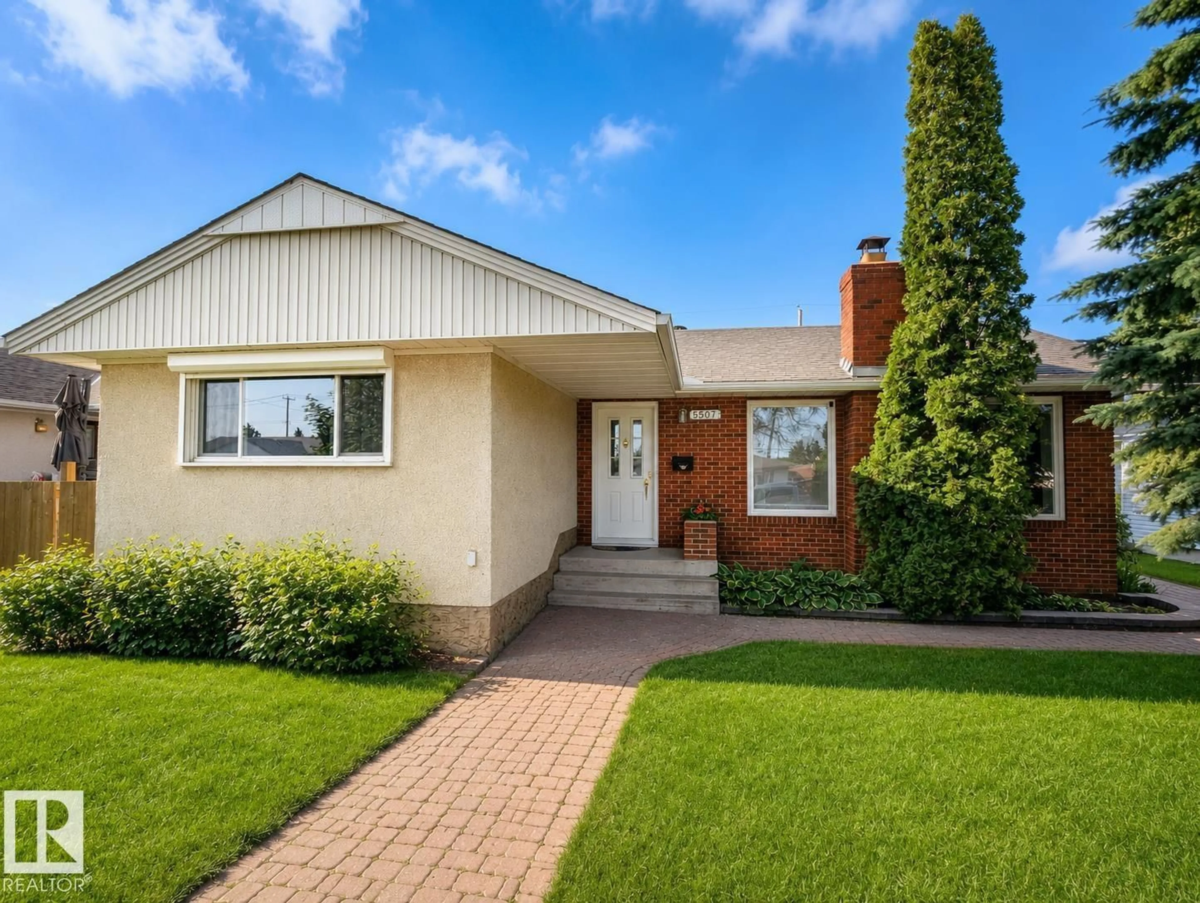 Home with brick exterior material, street for 5507 102A AV, Edmonton Alberta T6A0R3