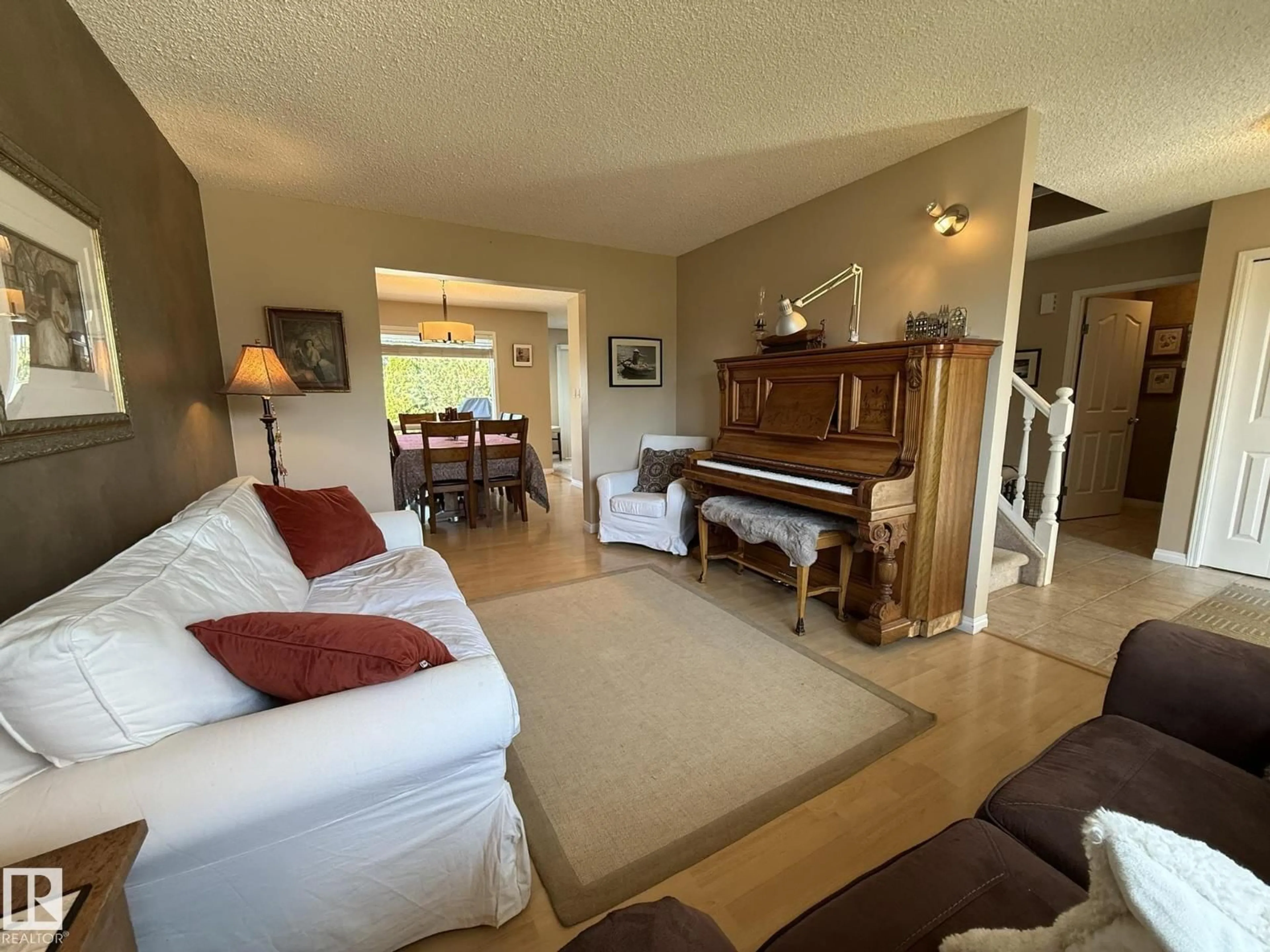 Living room with furniture, unknown for 5604 57 AV, Beaumont Alberta T4X1A7