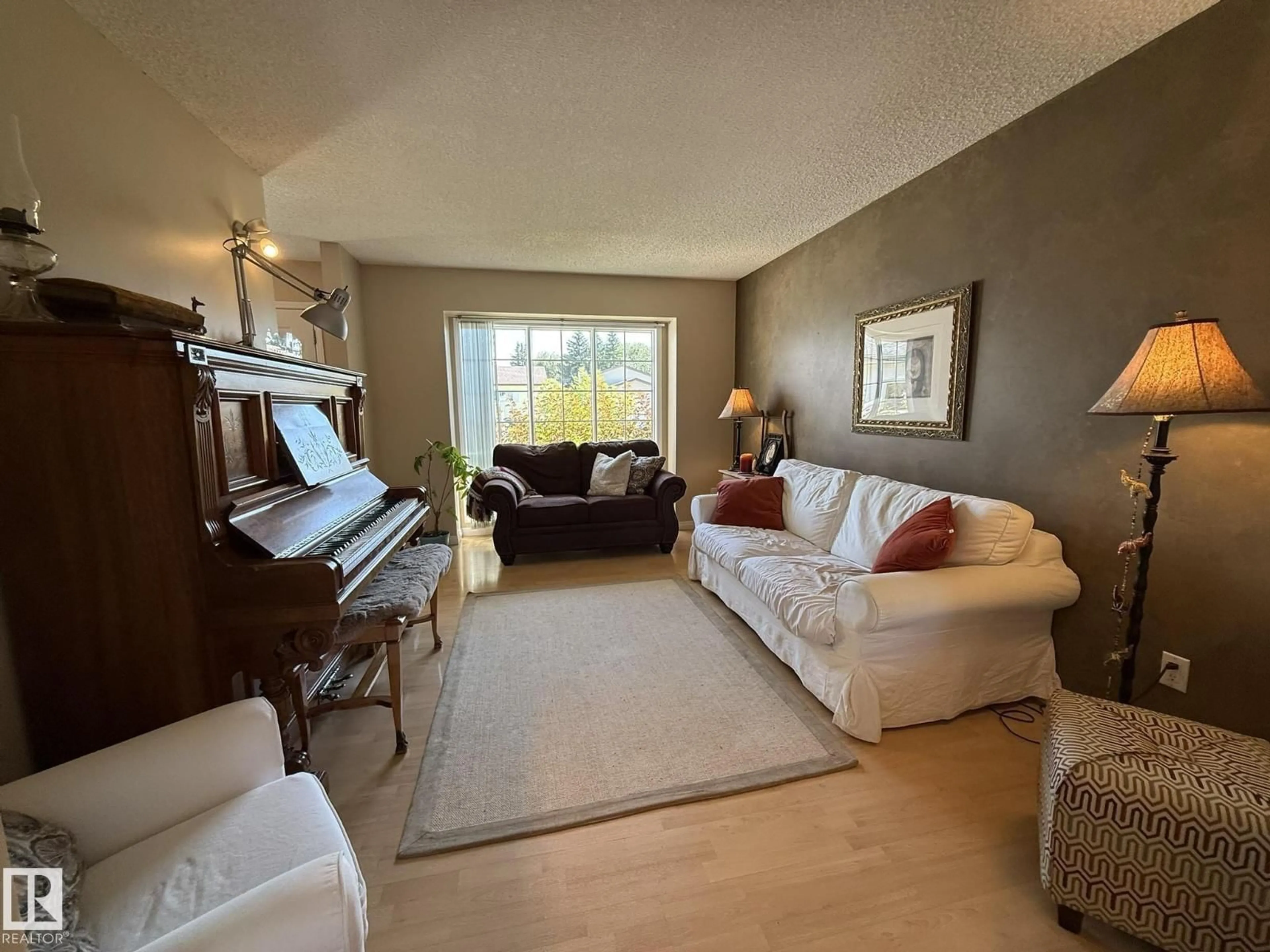 Living room with furniture, unknown for 5604 57 AV, Beaumont Alberta T4X1A7