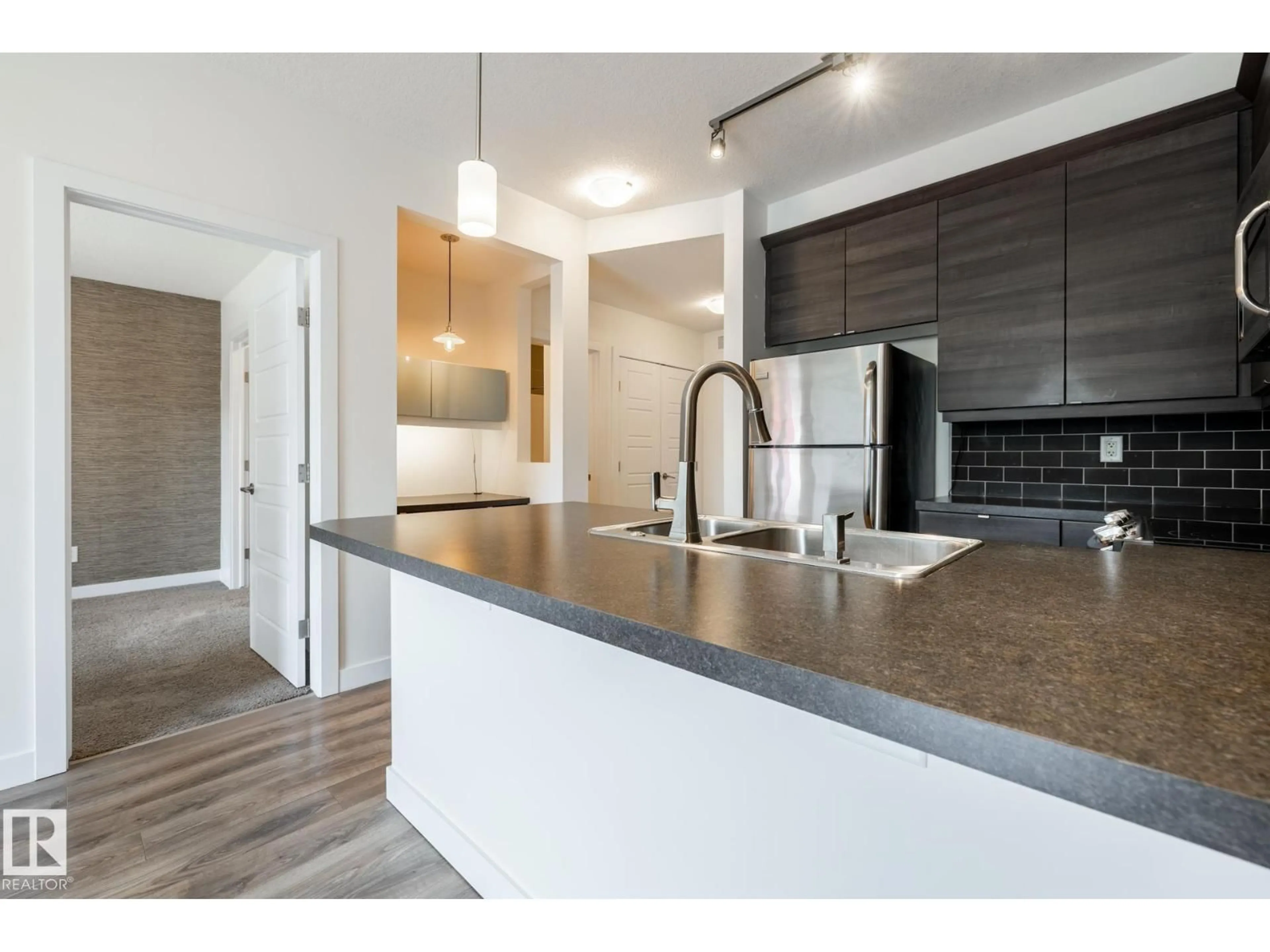 Open concept kitchen, unknown for #215 - 2590 ANDERSON WY, Edmonton Alberta T6W0R2