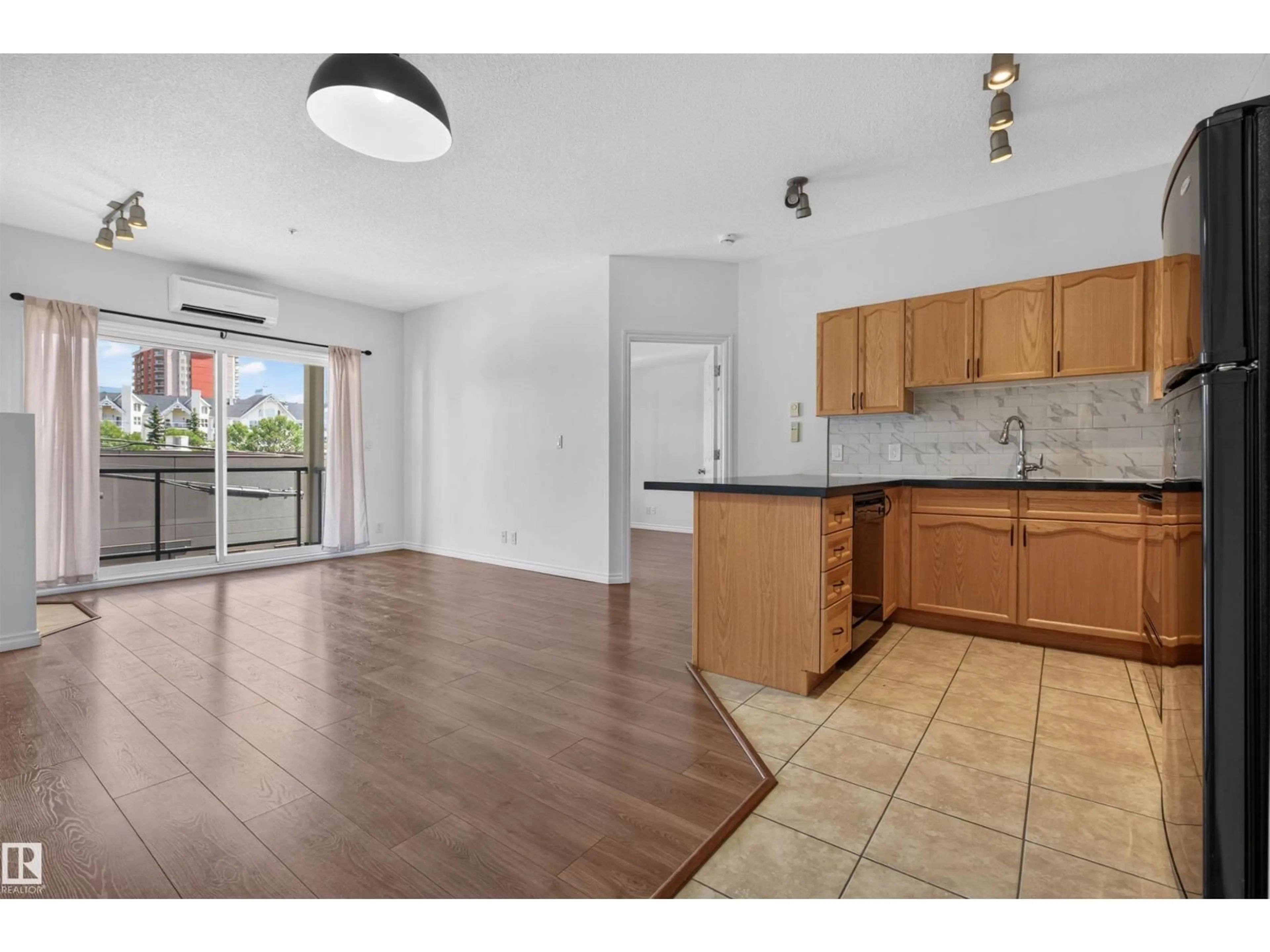 Open concept kitchen, unknown for 209 - 10235 112 ST NW, Edmonton Alberta T5K1M7
