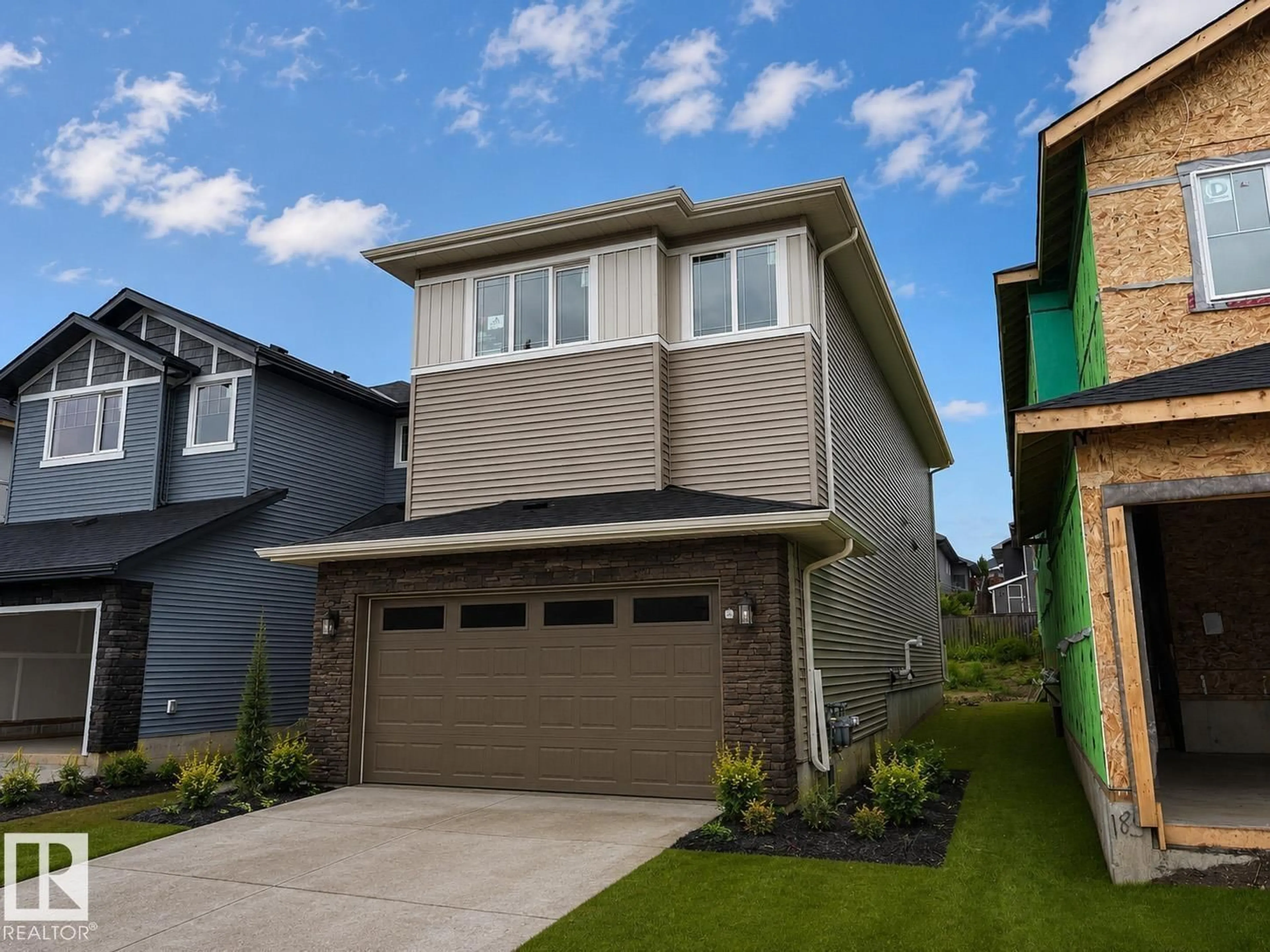 Home with vinyl exterior material, street for 189 WYATT RG, Fort Saskatchewan Alberta T8L0Y3