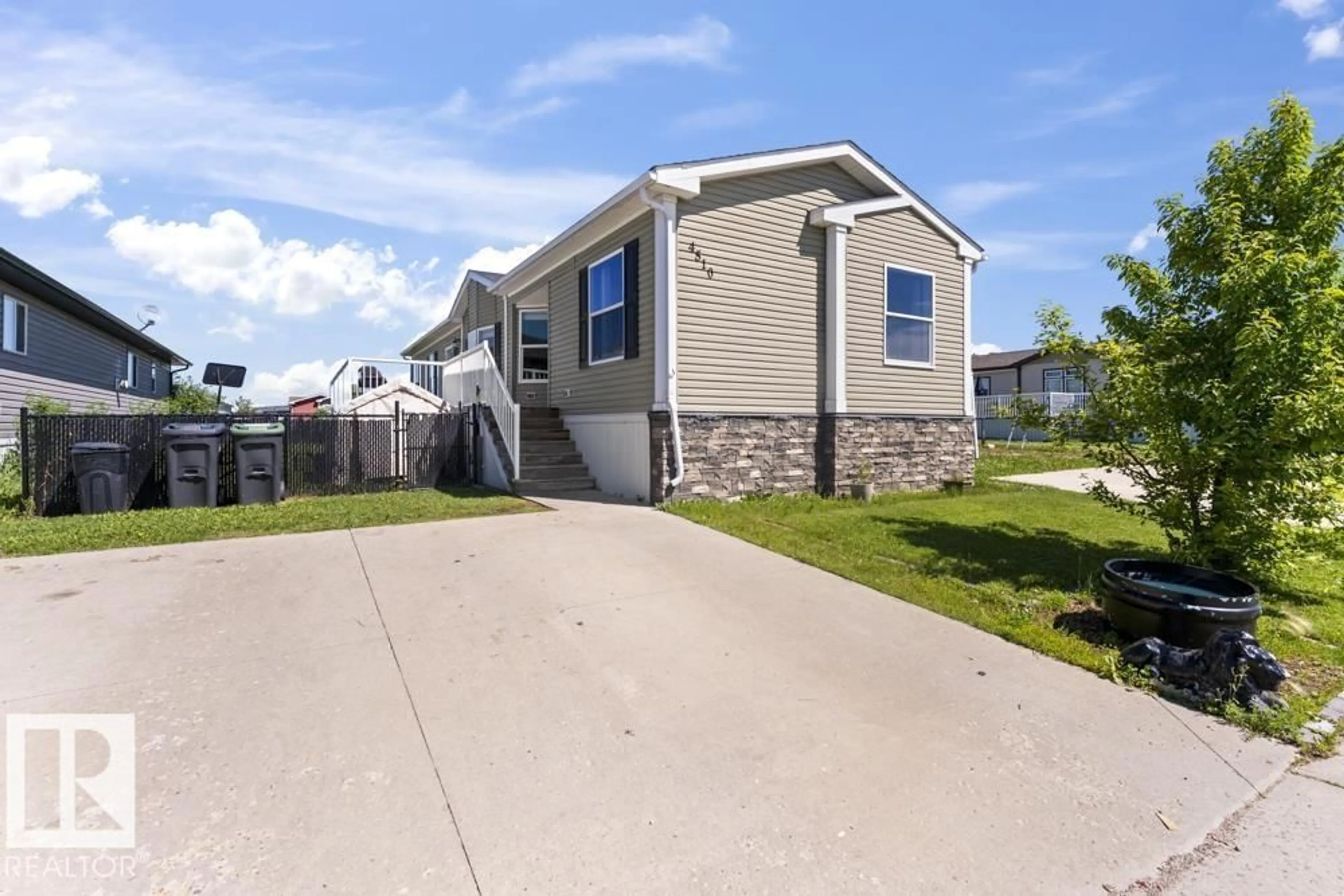 Home with vinyl exterior material, street for 4510 SNOWBIRD LN, Cold Lake Alberta T9M0C6