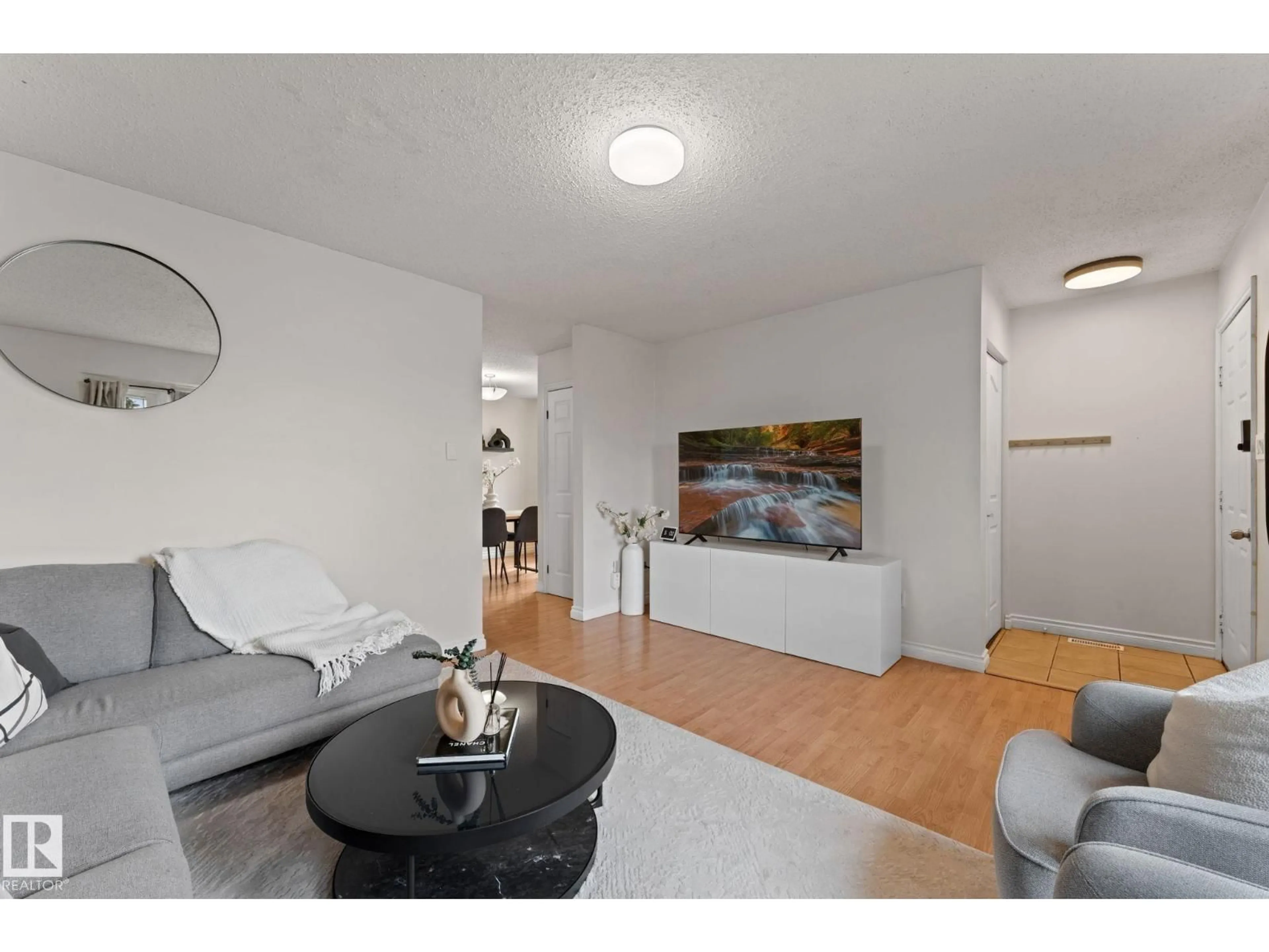 Living room with furniture, unknown for 4621 126 AV, Edmonton Alberta T5A4L1