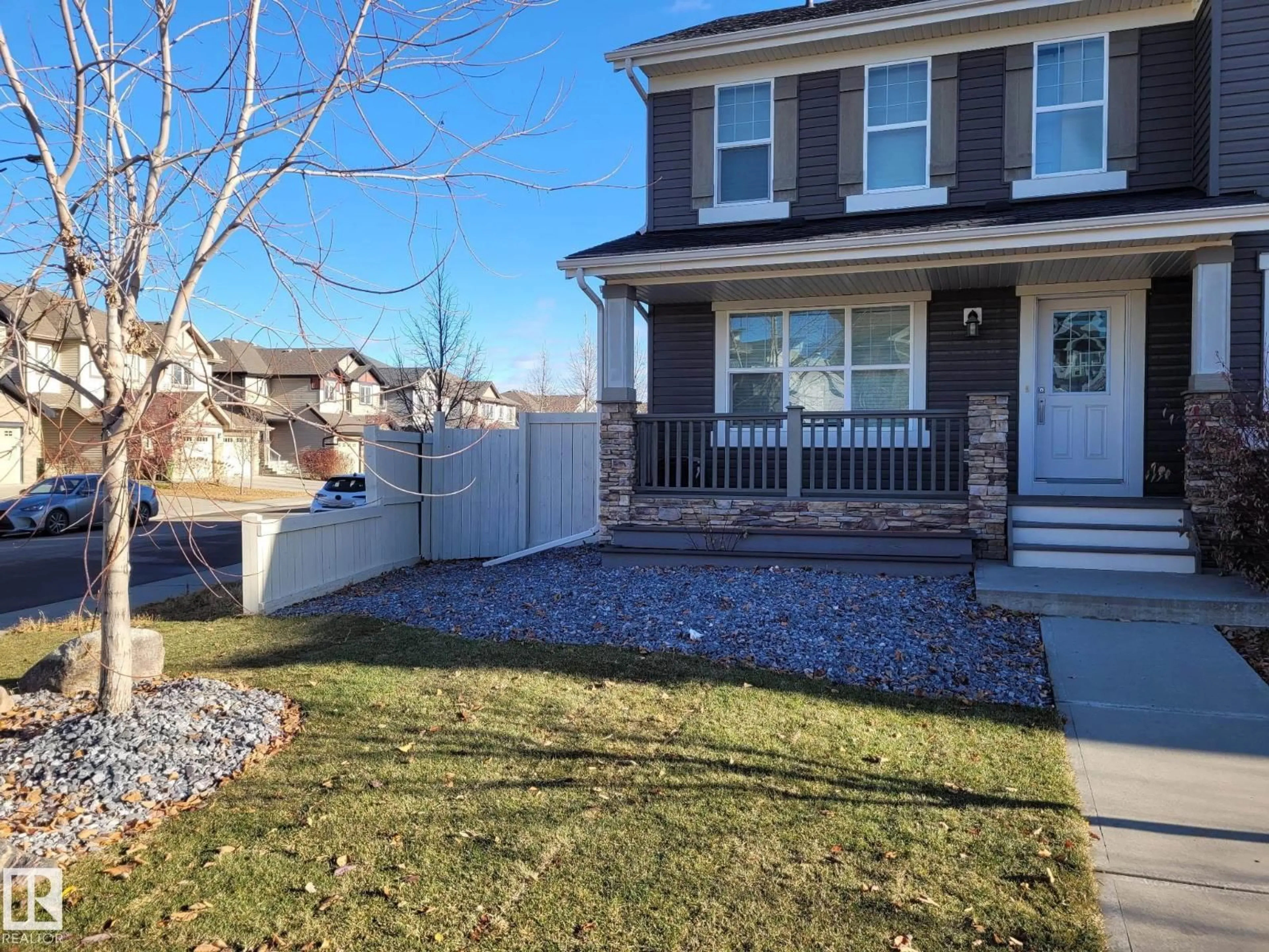 Home with vinyl exterior material, street for SW - 1007 162 ST, Edmonton Alberta T6W2G9