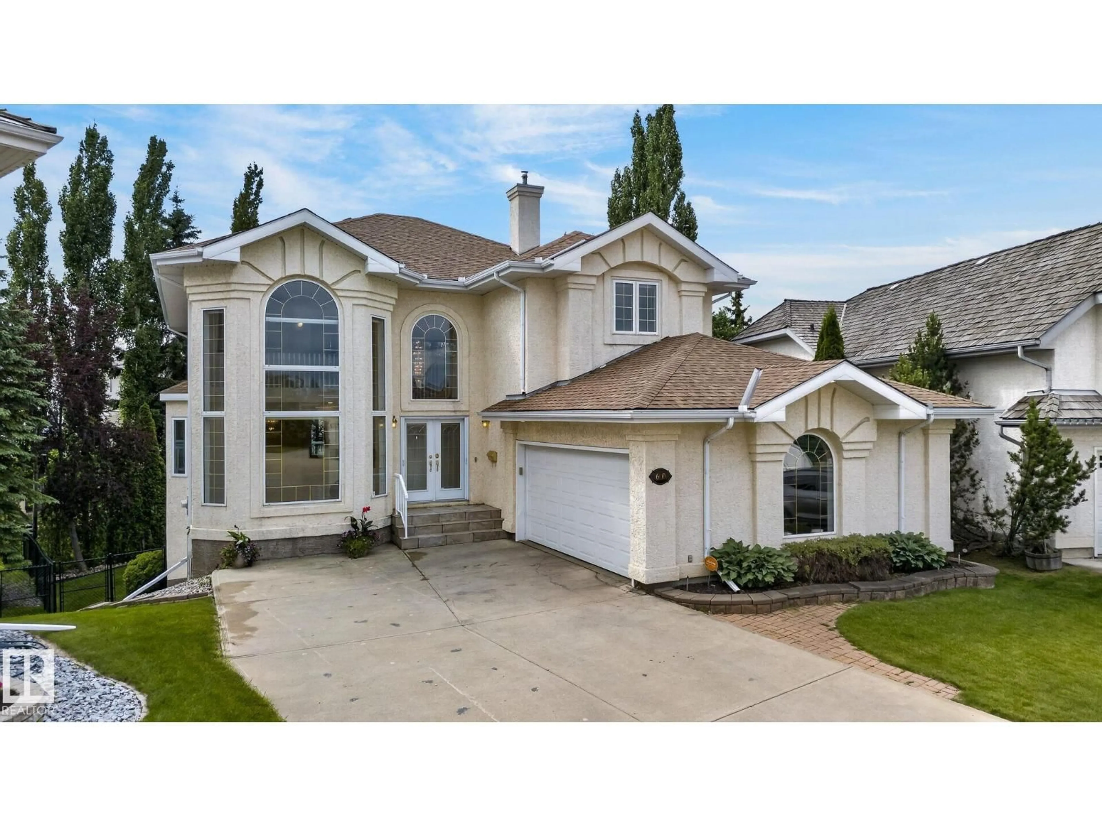 Home with vinyl exterior material, street for 610 HUNTERS CLOSE, Edmonton Alberta T6R2W2